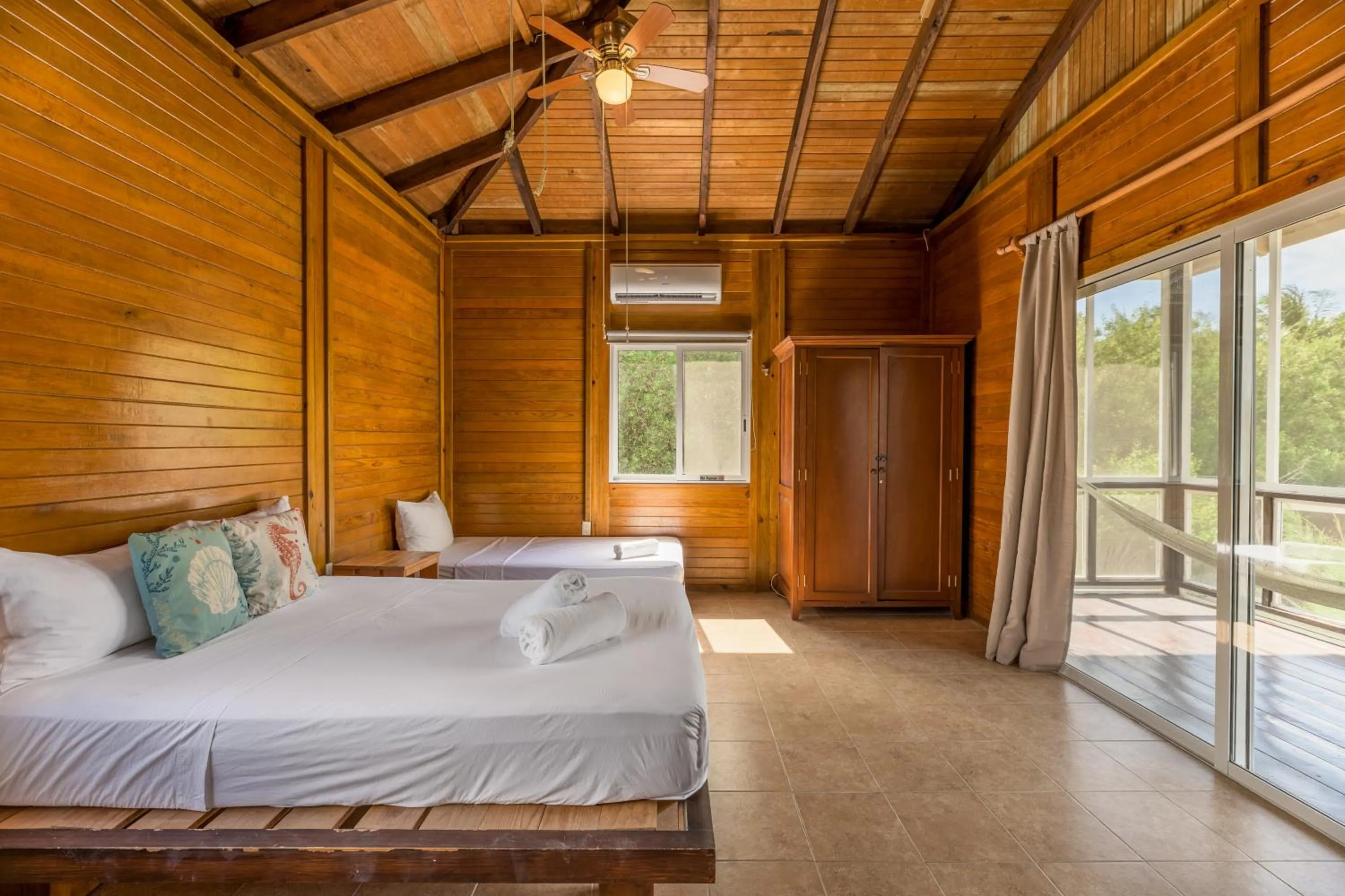 Photo of the whole room, Bed in Tekio Beach Hotel