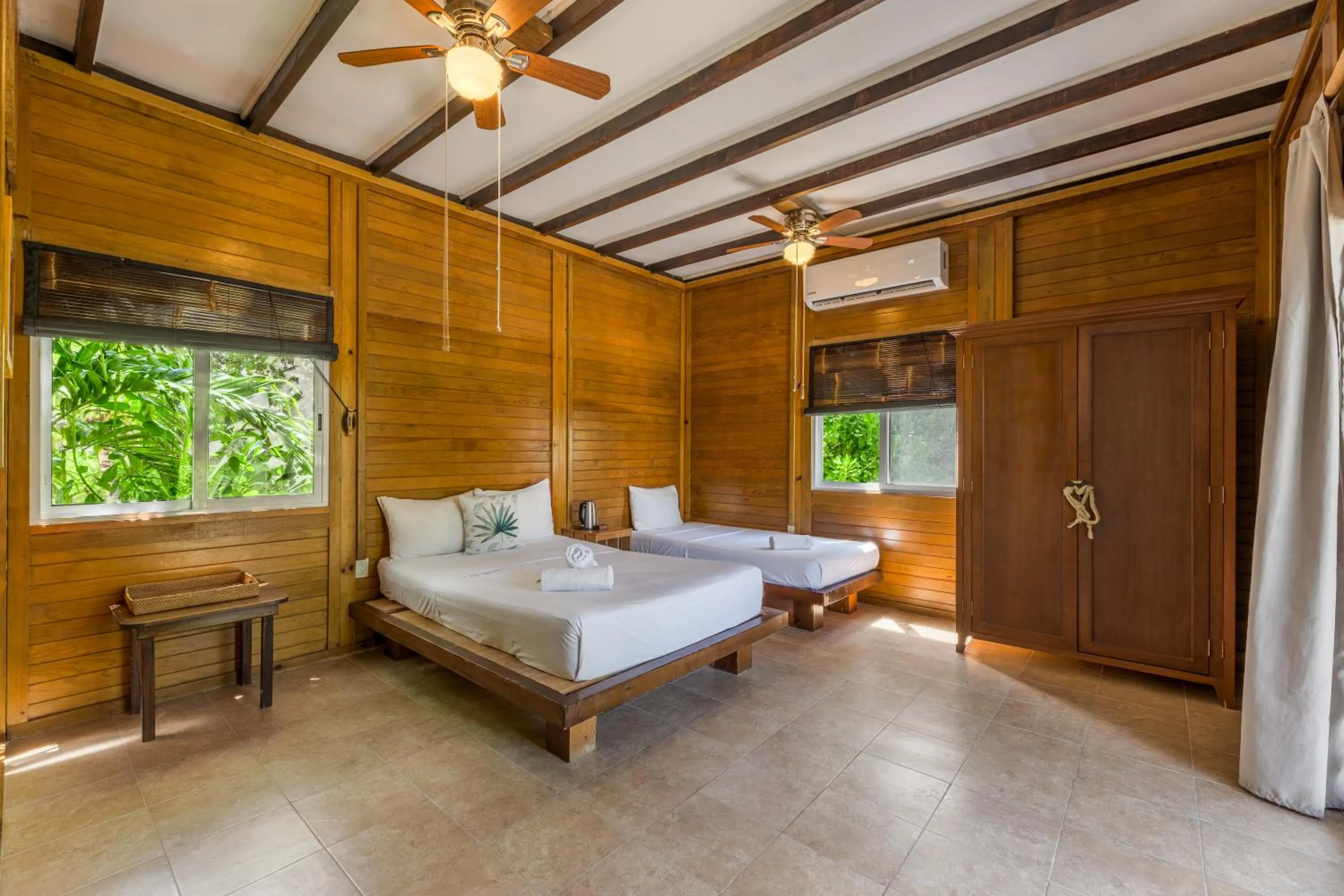 Photo of the whole room, Bed in Tekio Beach Hotel