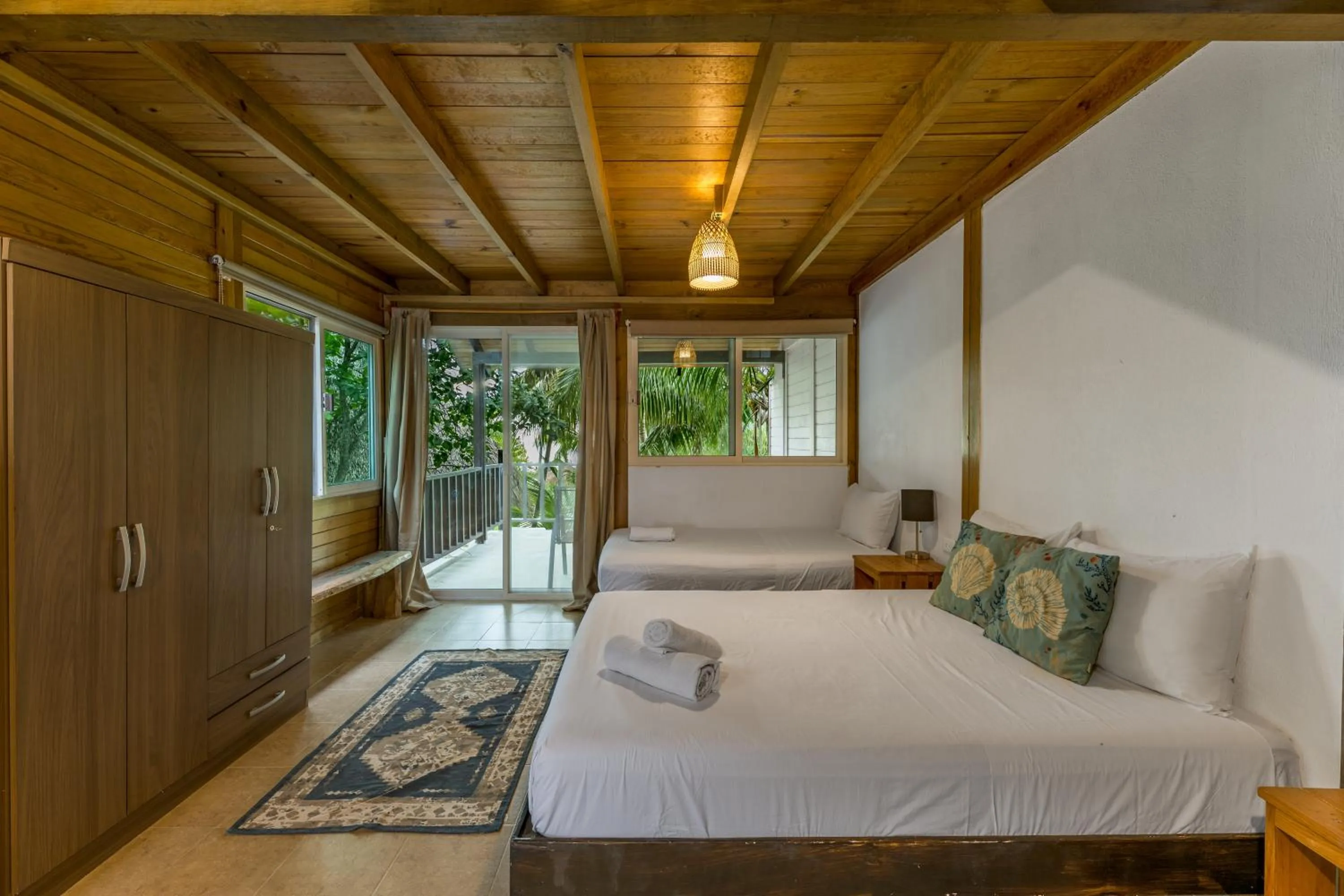 Bed in Tekio Beach Hotel