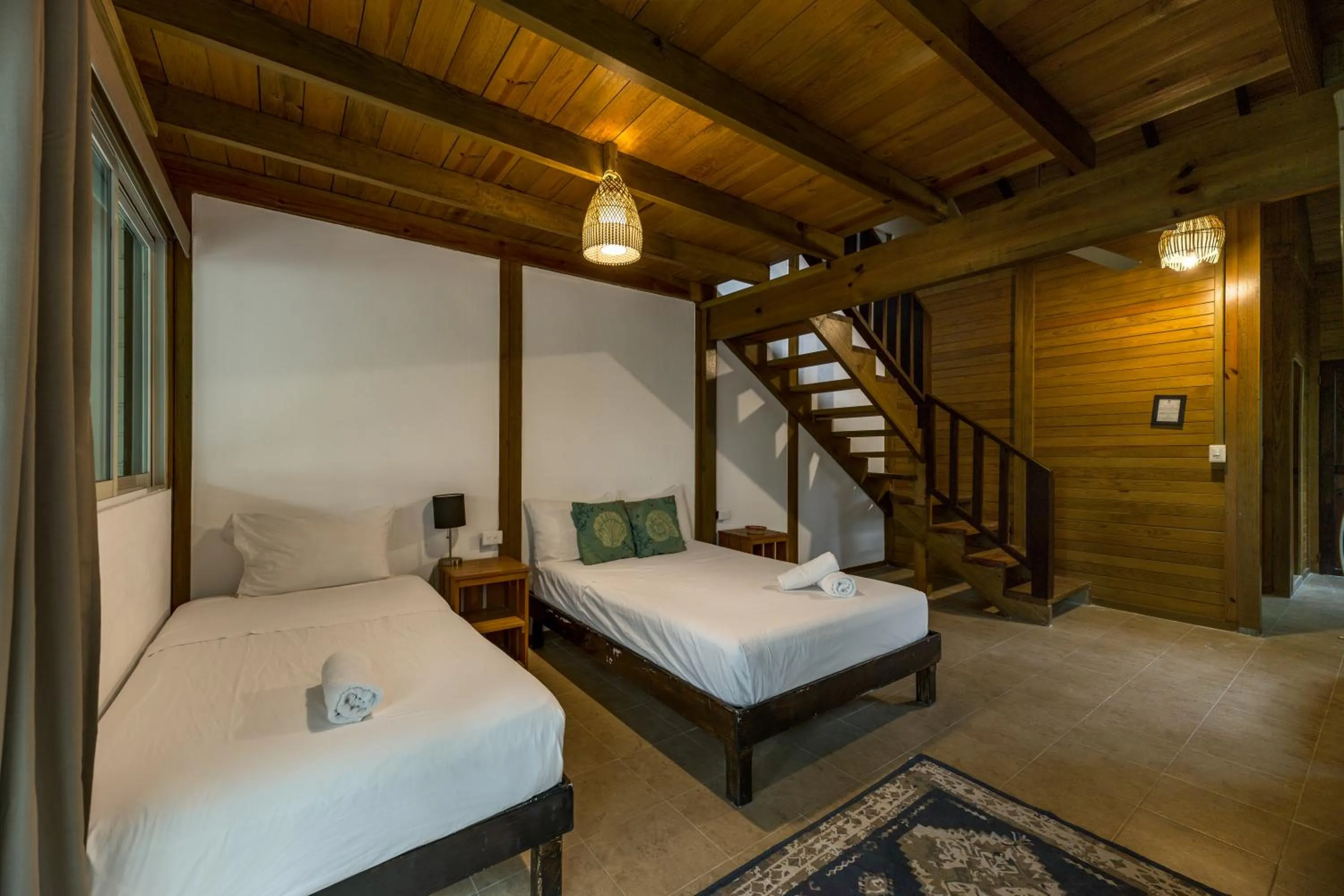 Bed in Tekio Beach Hotel