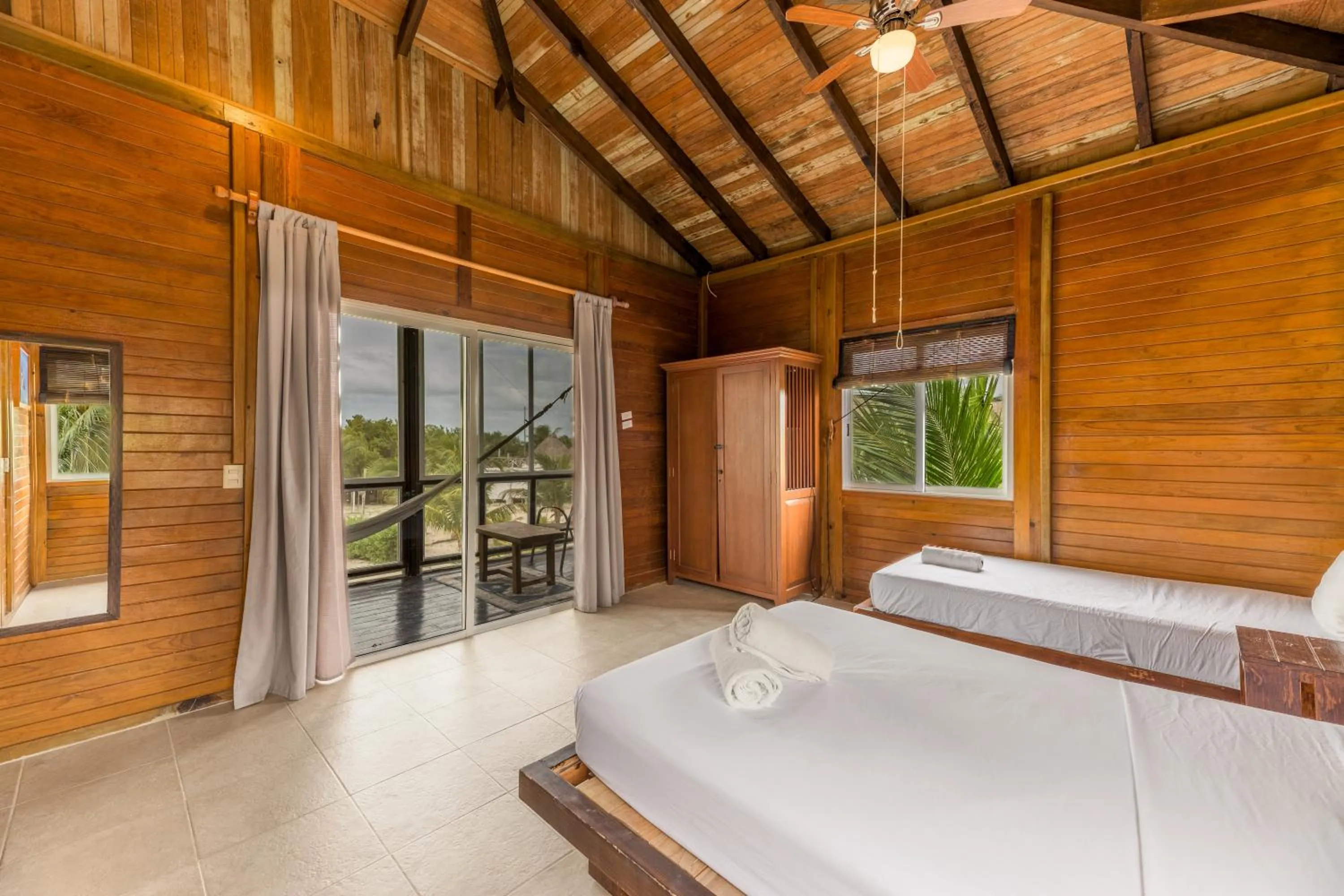 Bed in Tekio Beach Hotel