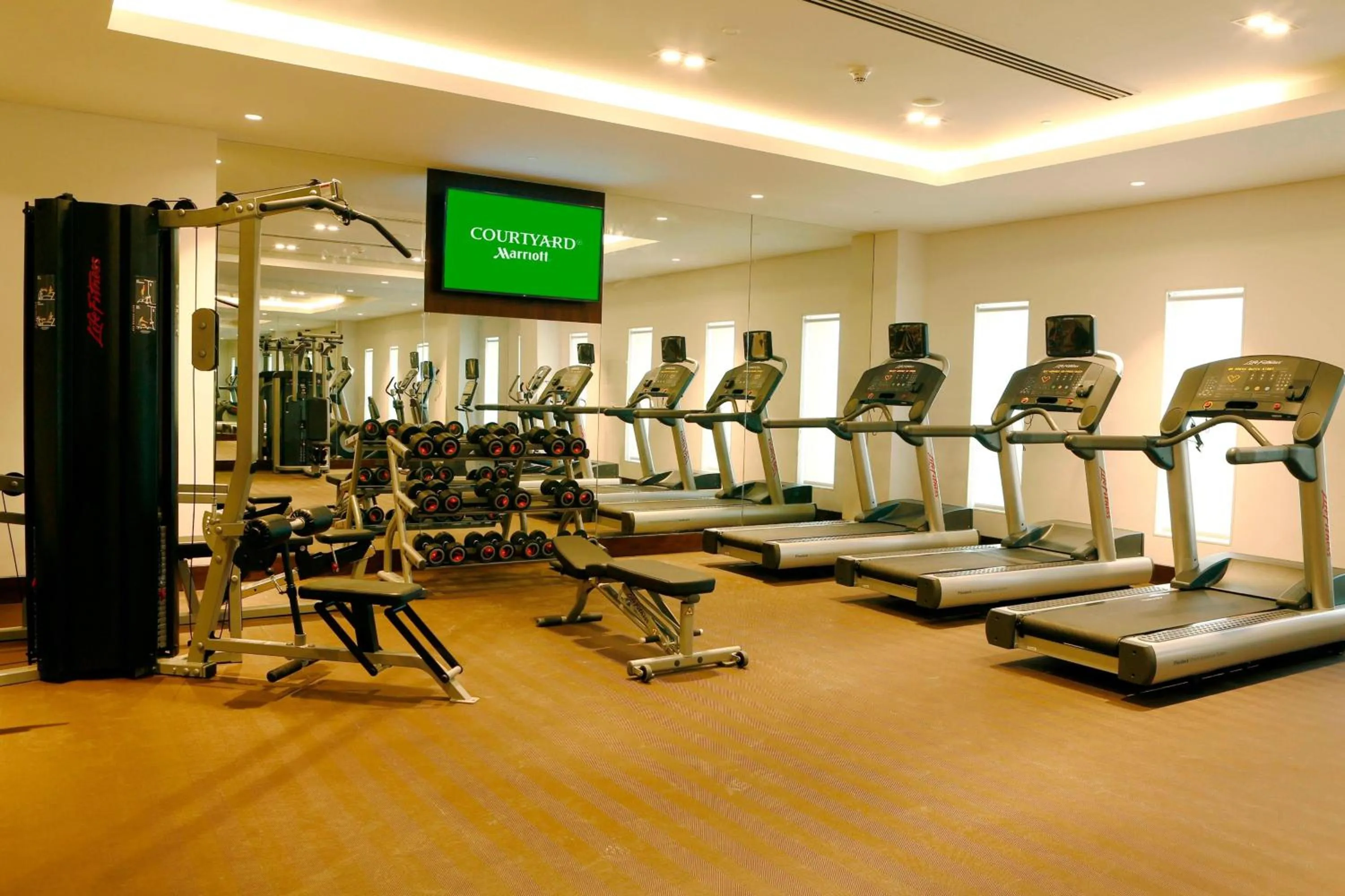 Fitness centre/facilities in Courtyard by Marriott Surat