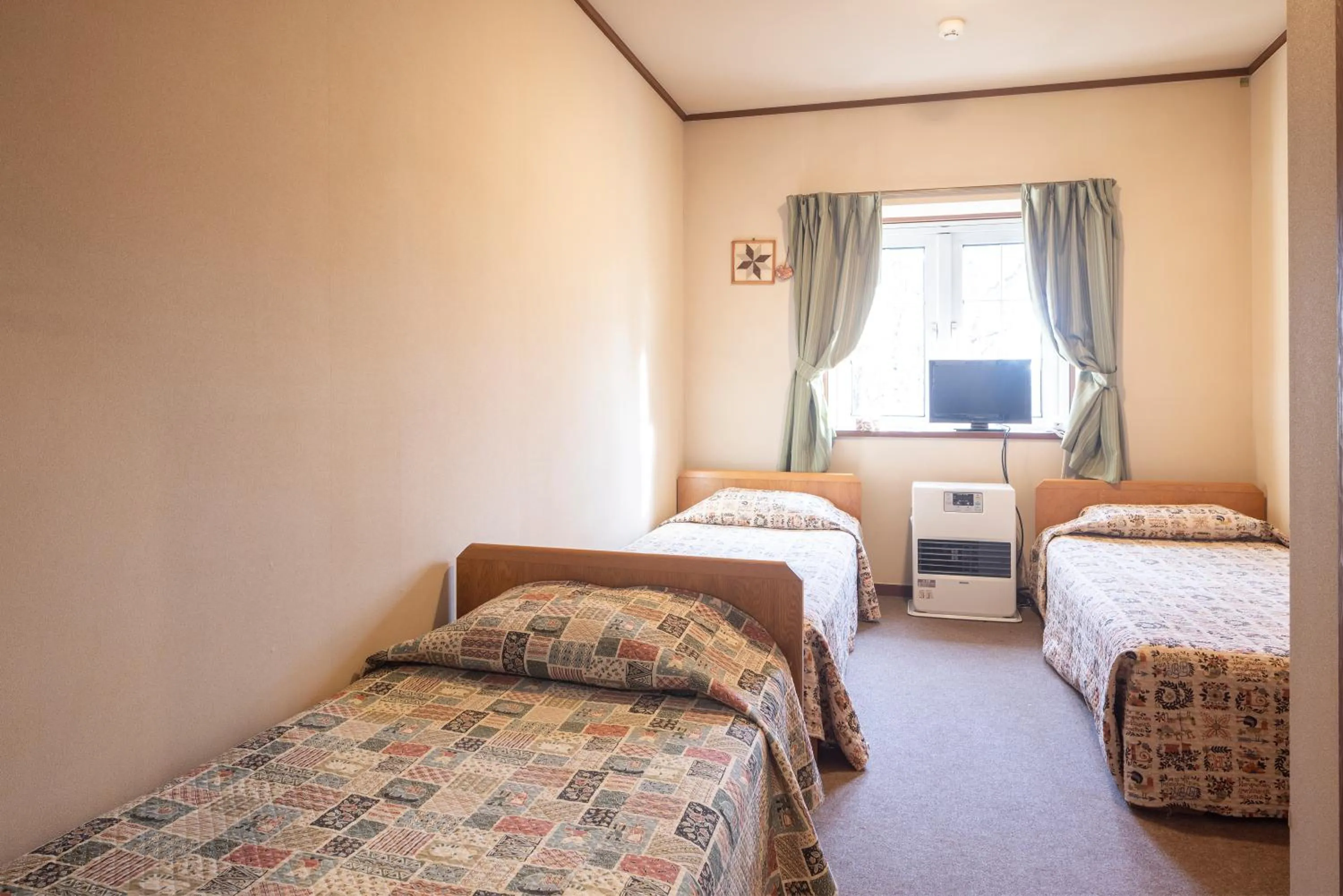 Bed in Pension Rapport in Tambara Plateau