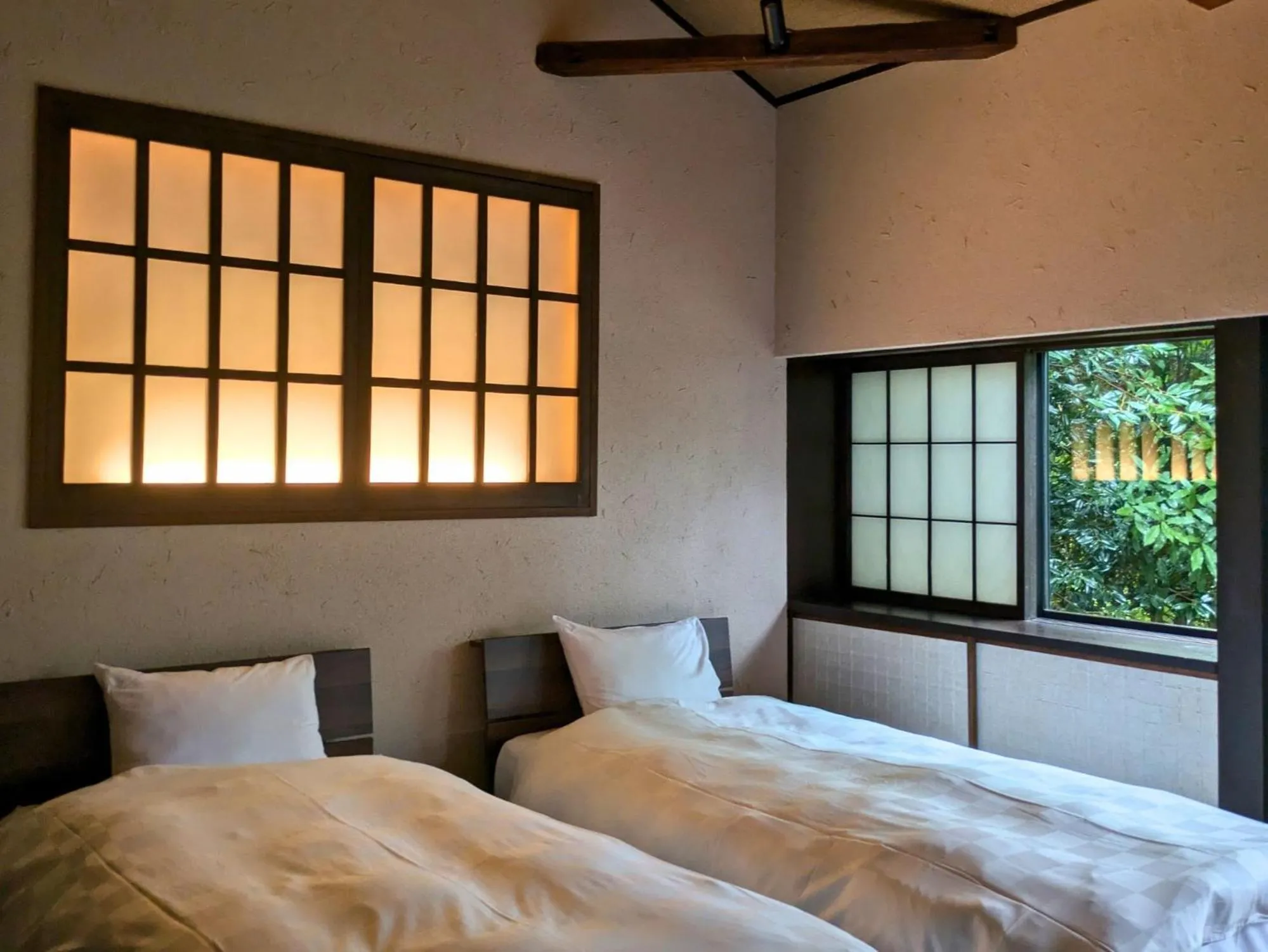 Bed in Machiya Hotel oyado baison