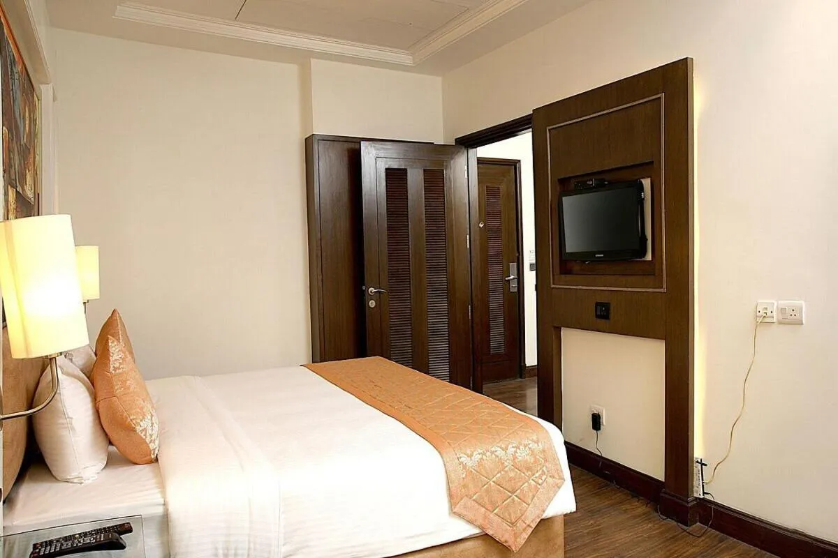 Bed in Inde Hotel Signature Tower