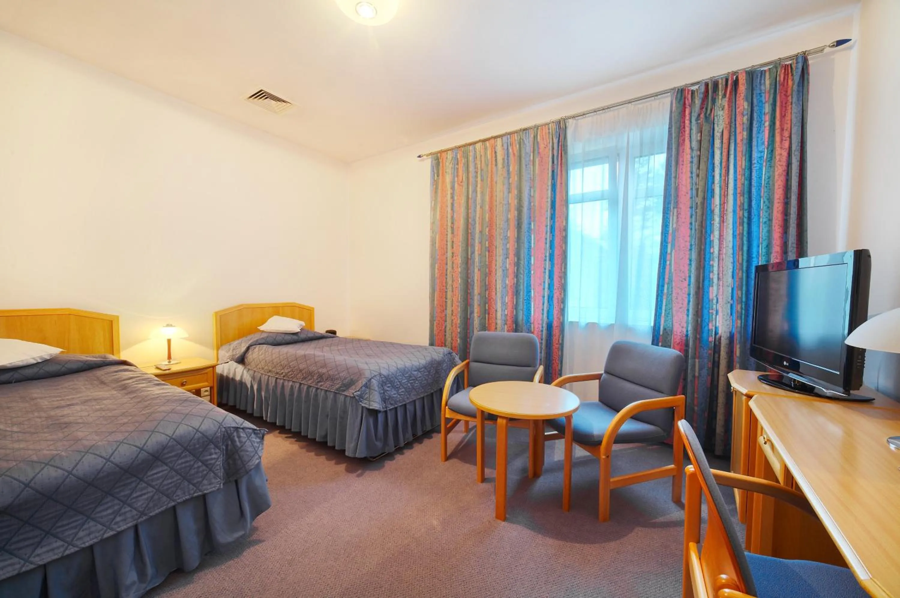 Photo of the whole room, Bed in Hotel Perła Bieszczadów Geovita