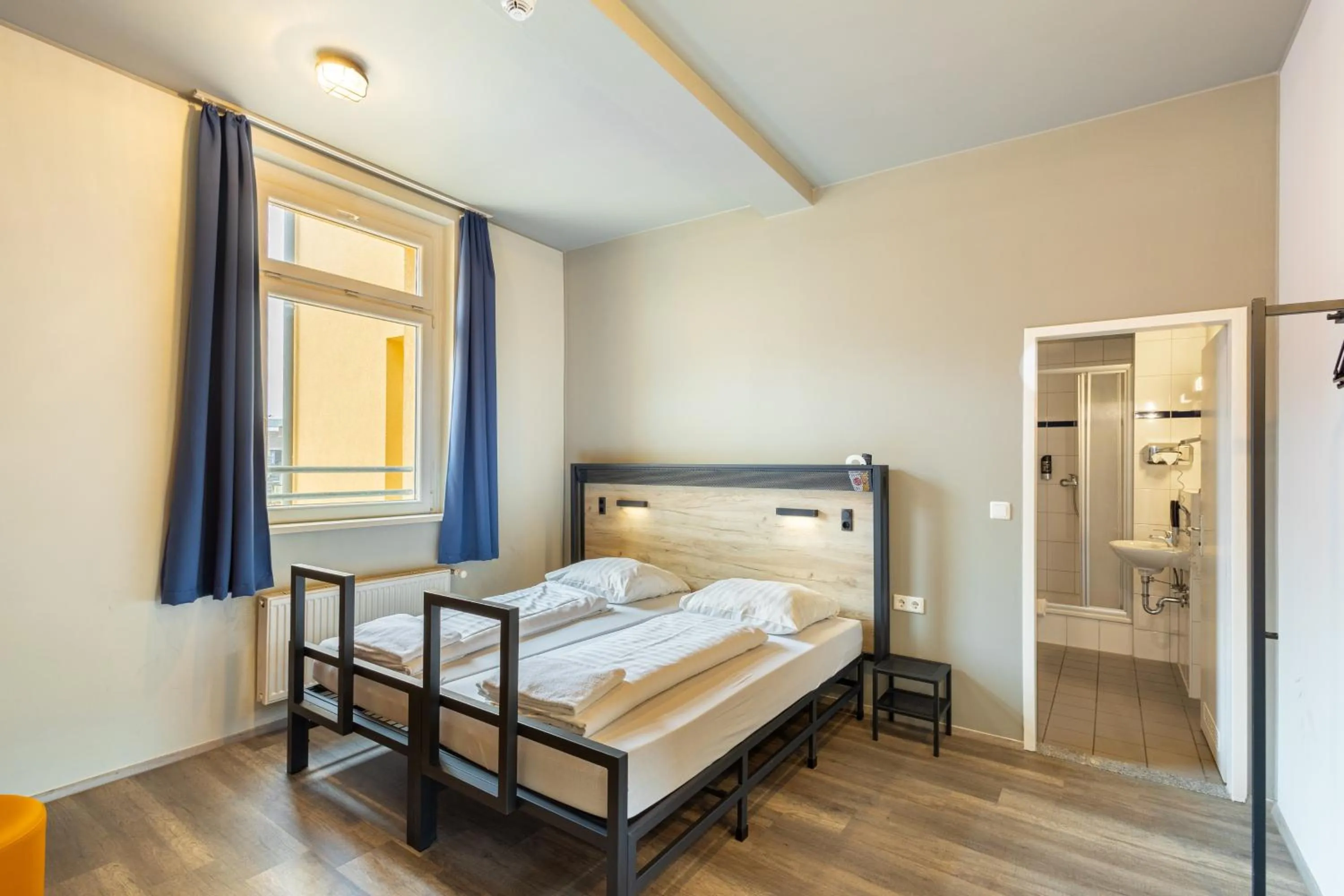 Photo of the whole room, Bed in a&o Dortmund Hauptbahnhof