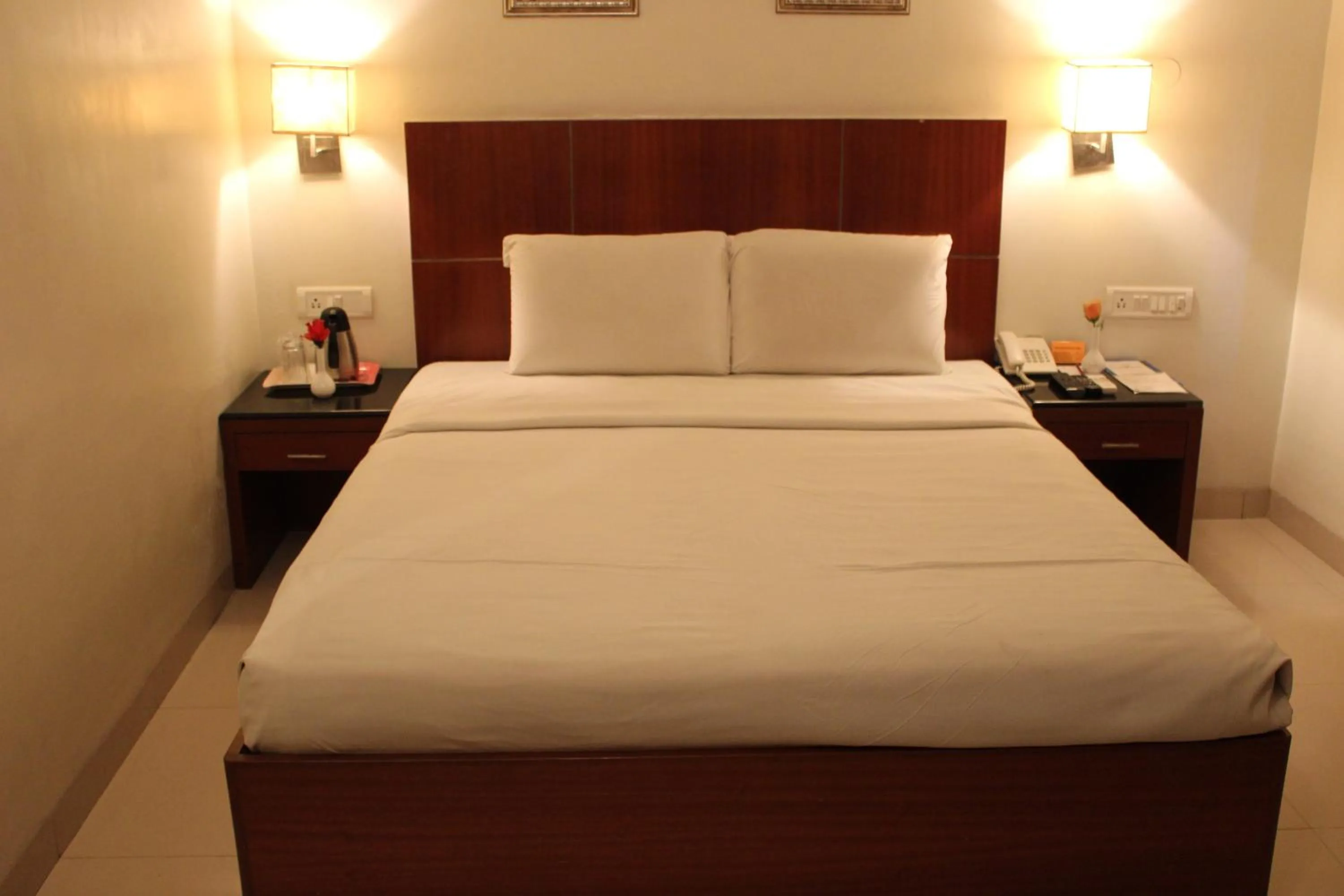 Bed in Hotel Stay Inn