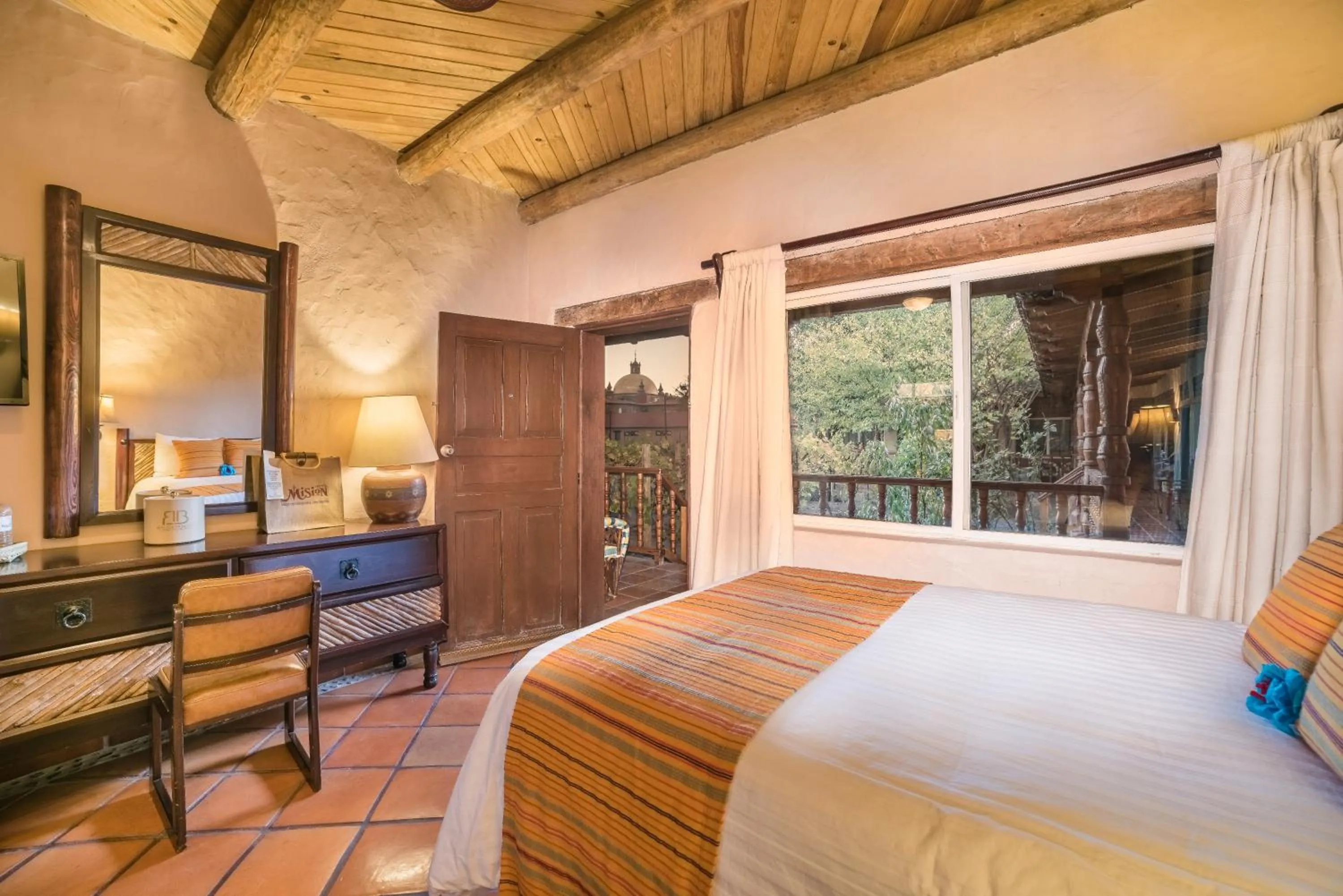 Bed in Hotel Misión Cerocahui a Balderrama Hotel Collection