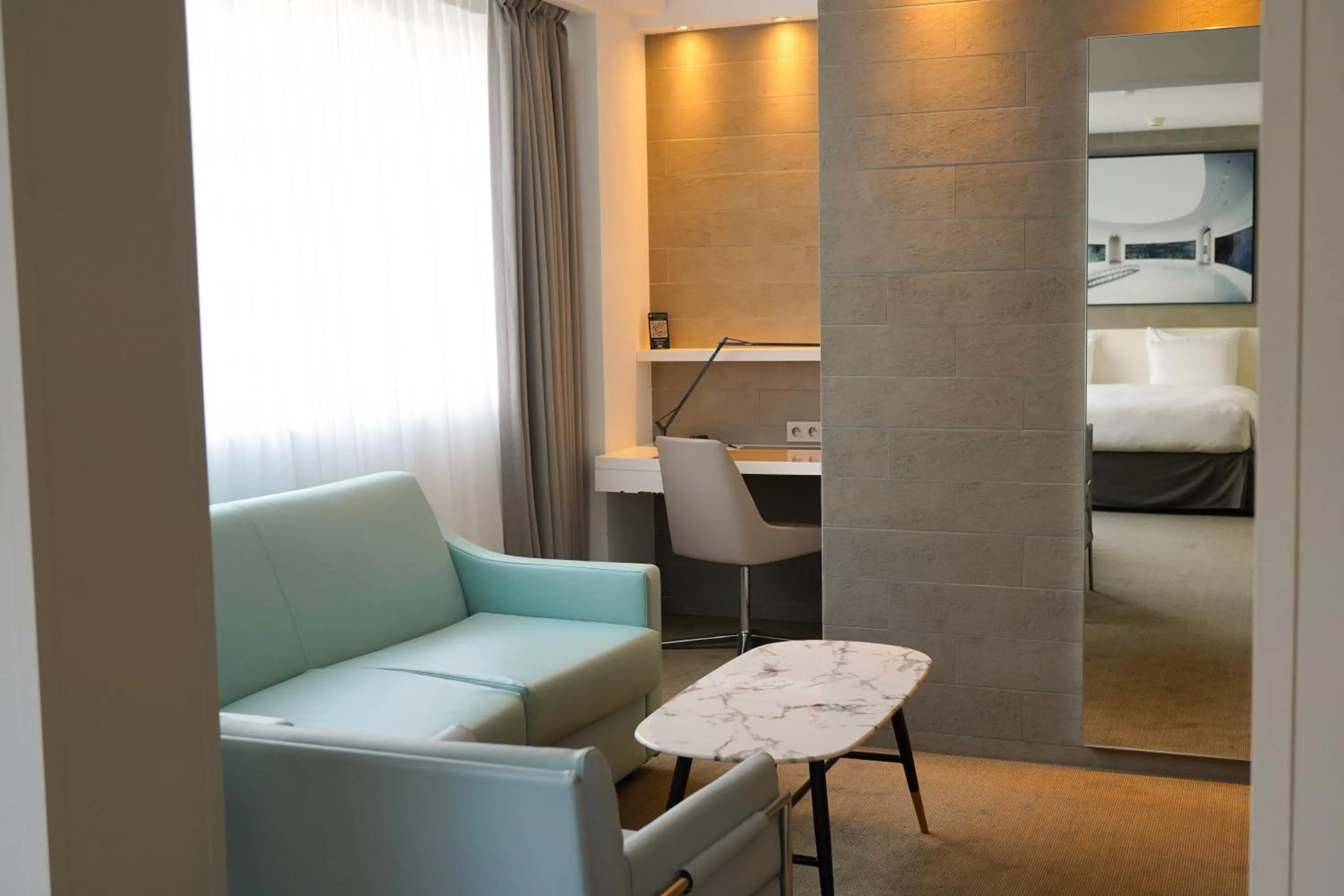 Living room, Bed in Pullman Paris Tour Eiffel