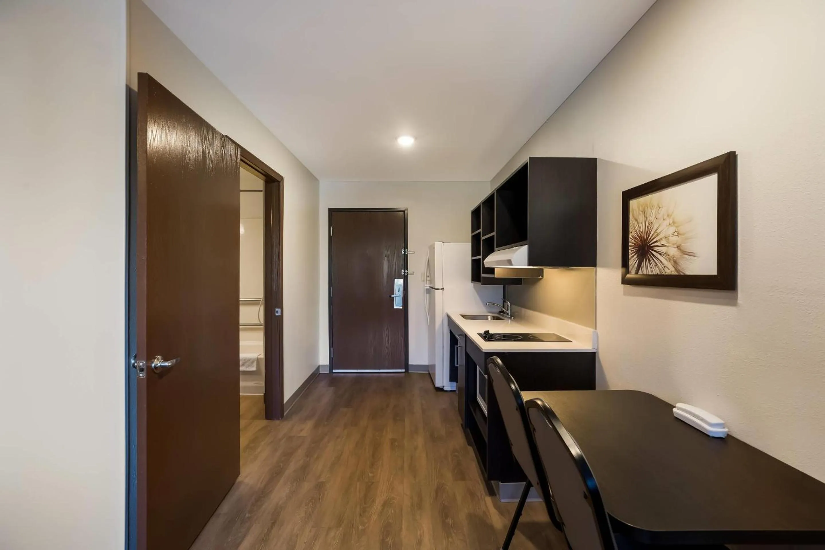 Kitchen or kitchenette in WoodSpring Suites Orlando West - Clermont