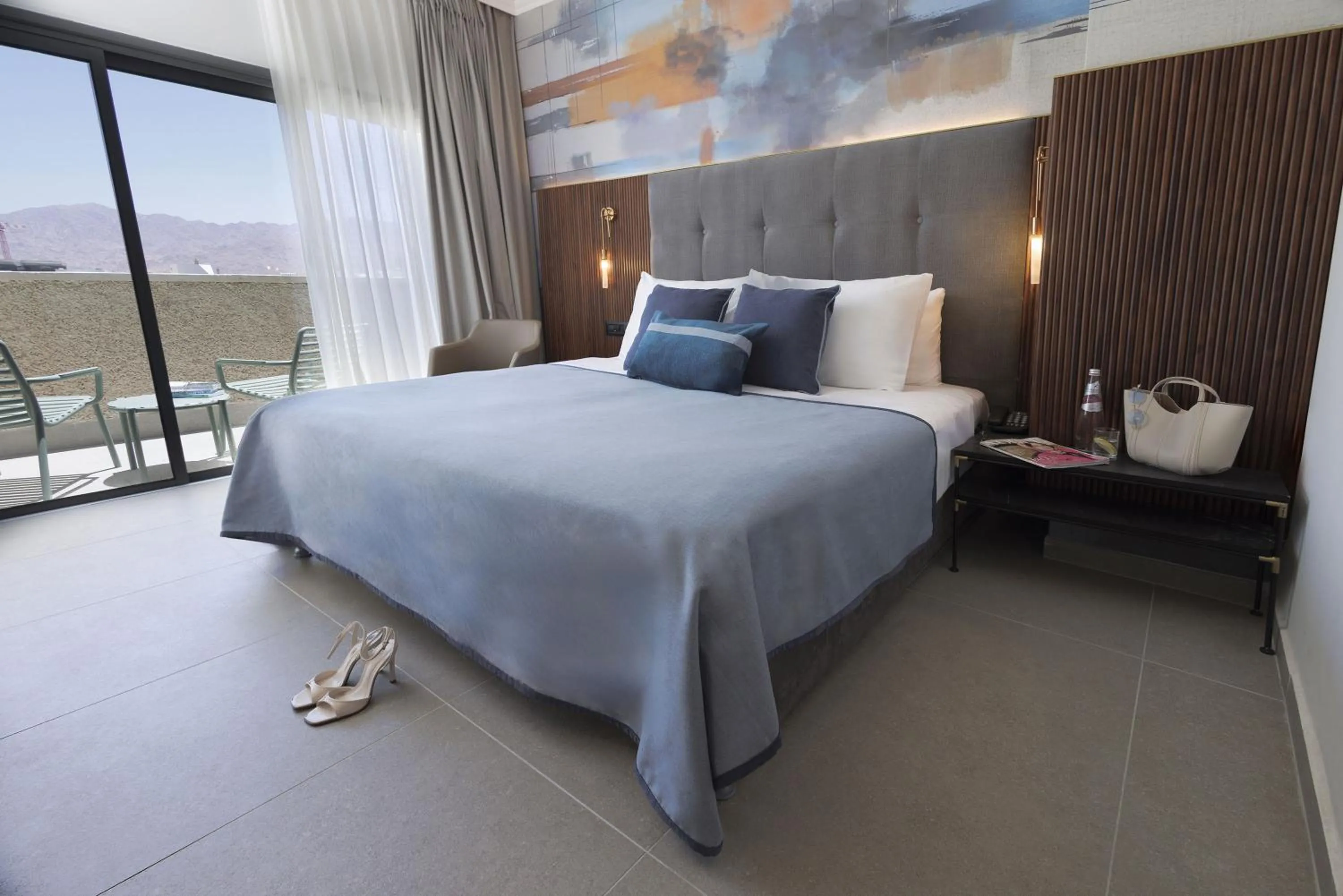 Bed in Caesar Premier Eilat Hotel