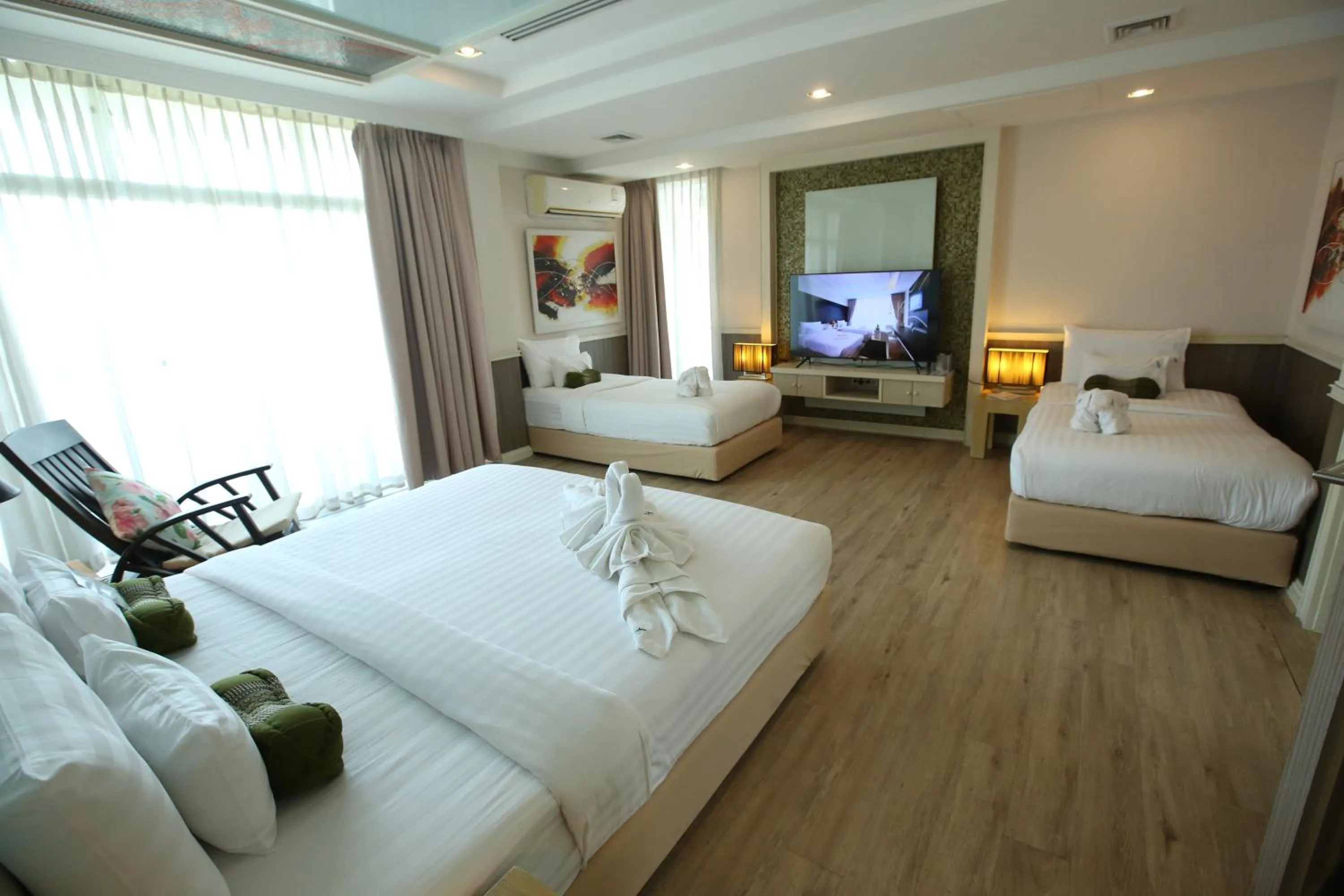 Photo of the whole room, Bed in A-Te Chumphon Hotel - SHA Plus