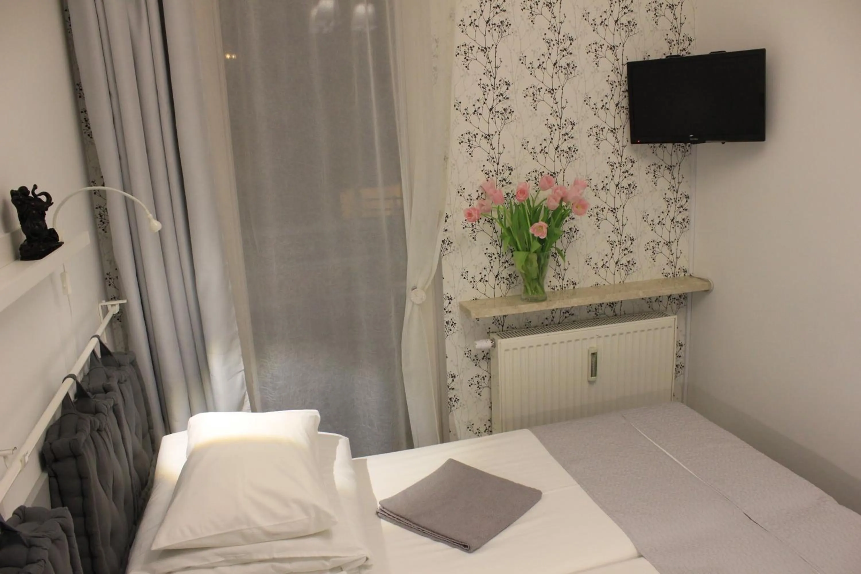 Decorative detail, Bed in Kolorowa Guest Rooms