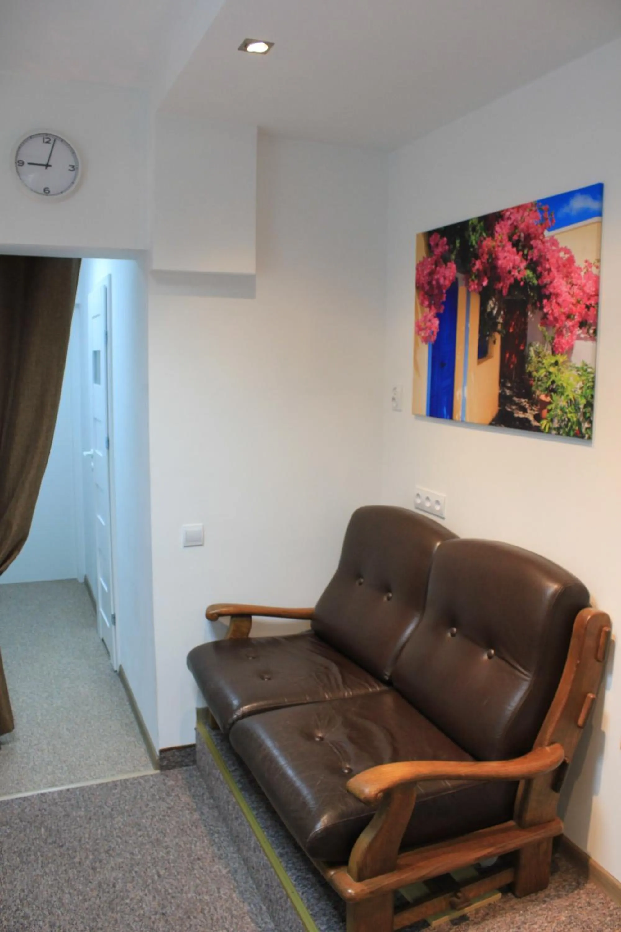 Seating area in Kolorowa Guest Rooms