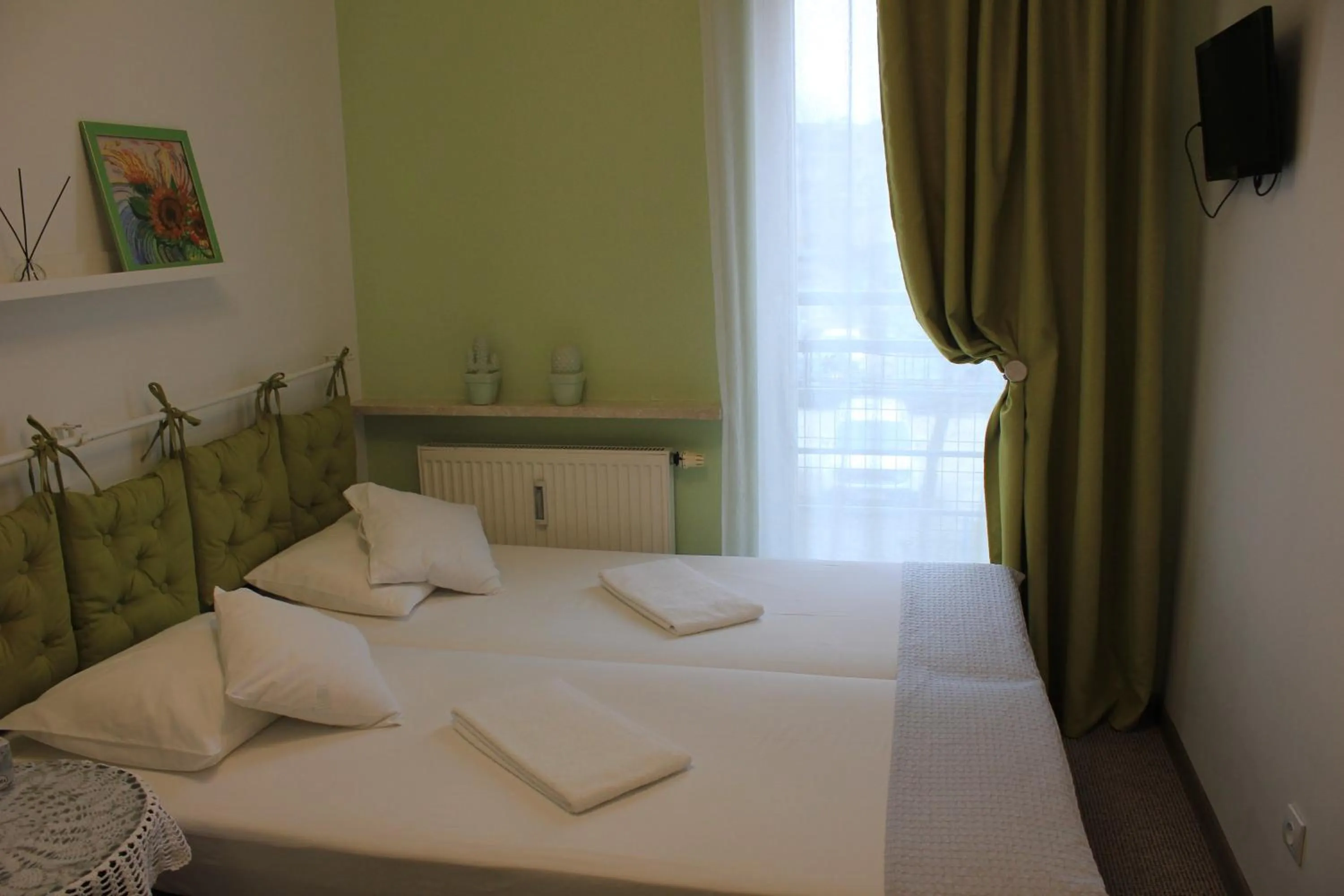 Decorative detail, Bed in Kolorowa Guest Rooms