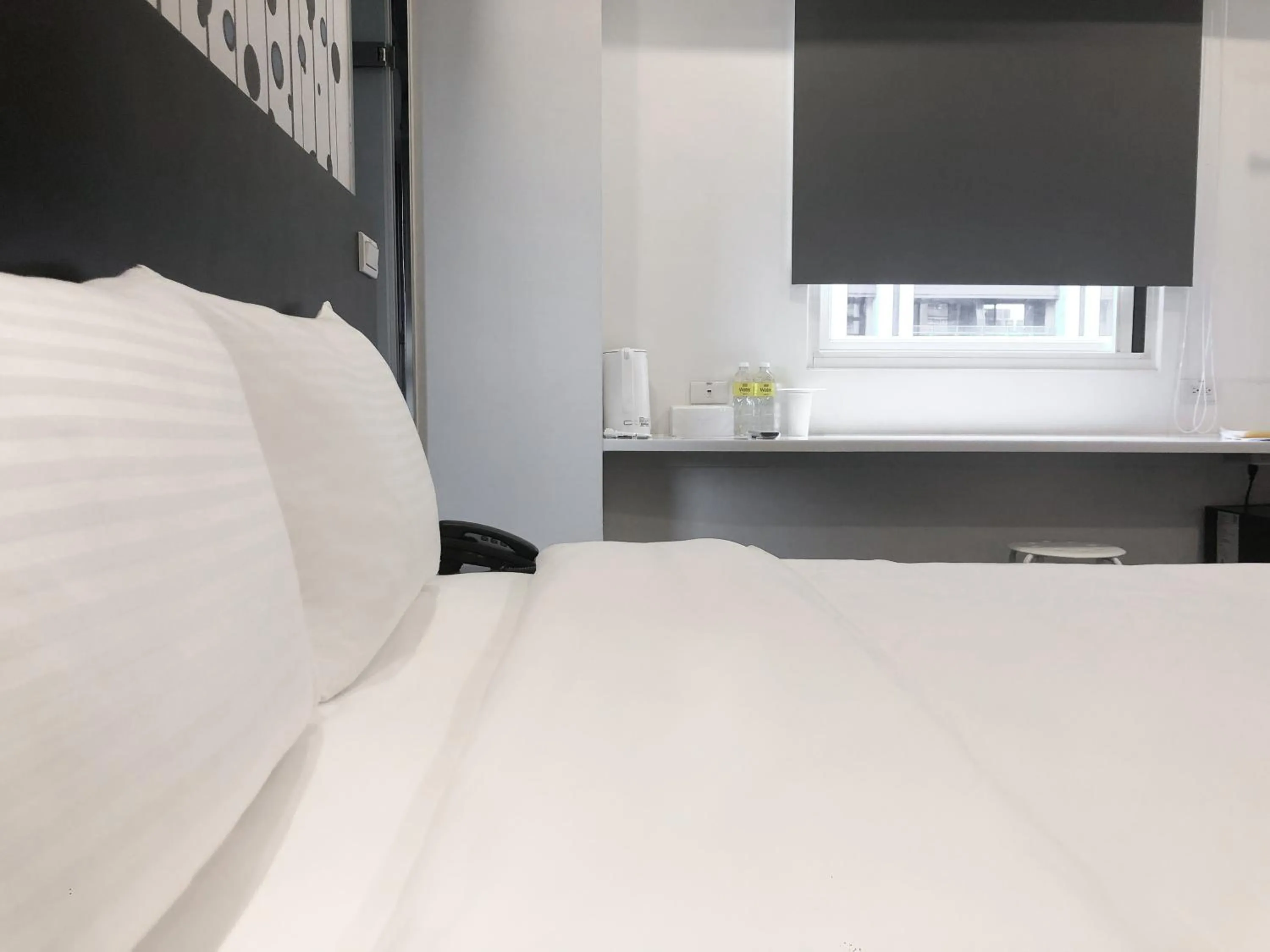 Bed in CHECK inn Express Taipei Yongkang