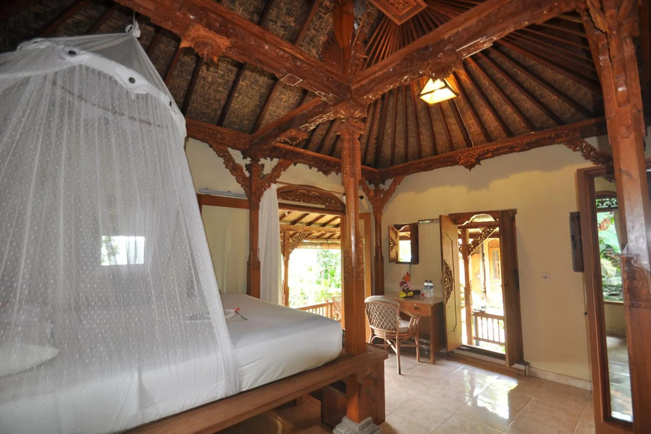 Bedroom in Puri Lumbung Cottages Restaurant & Spa Munduk