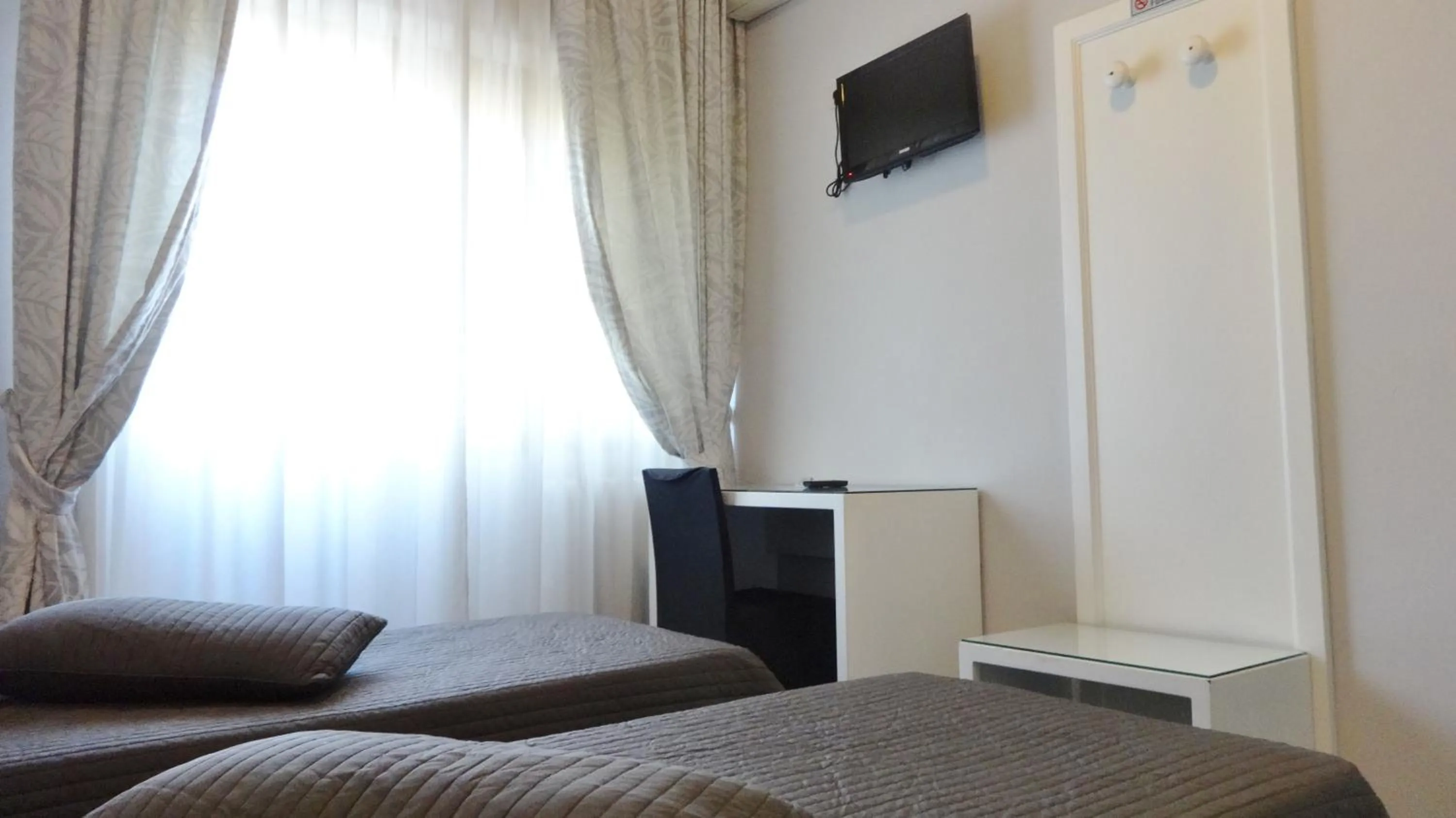 Photo of the whole room, TV/Entertainment Center in Hotel Marte