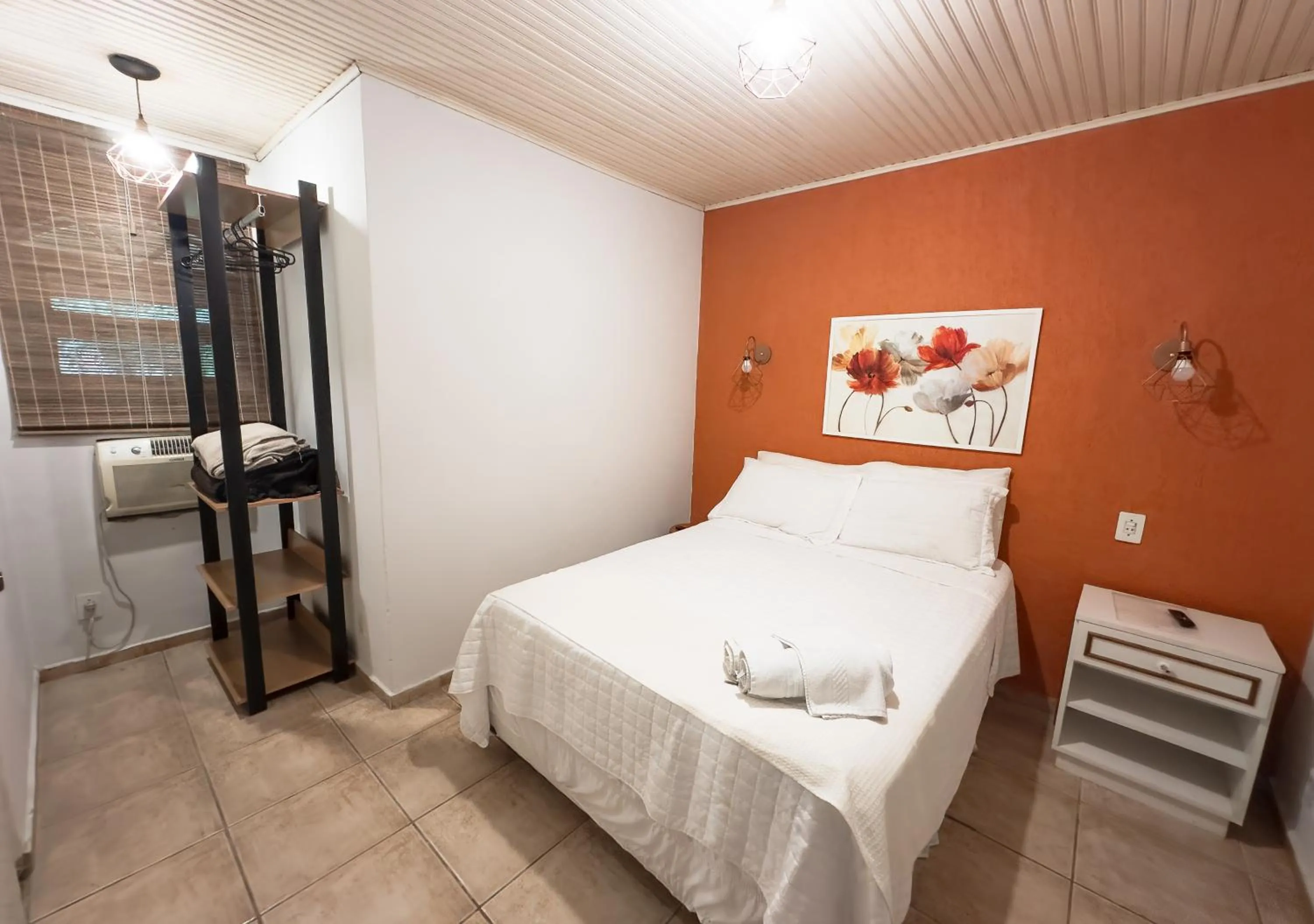 Bed in Pousada Flor de Penedo