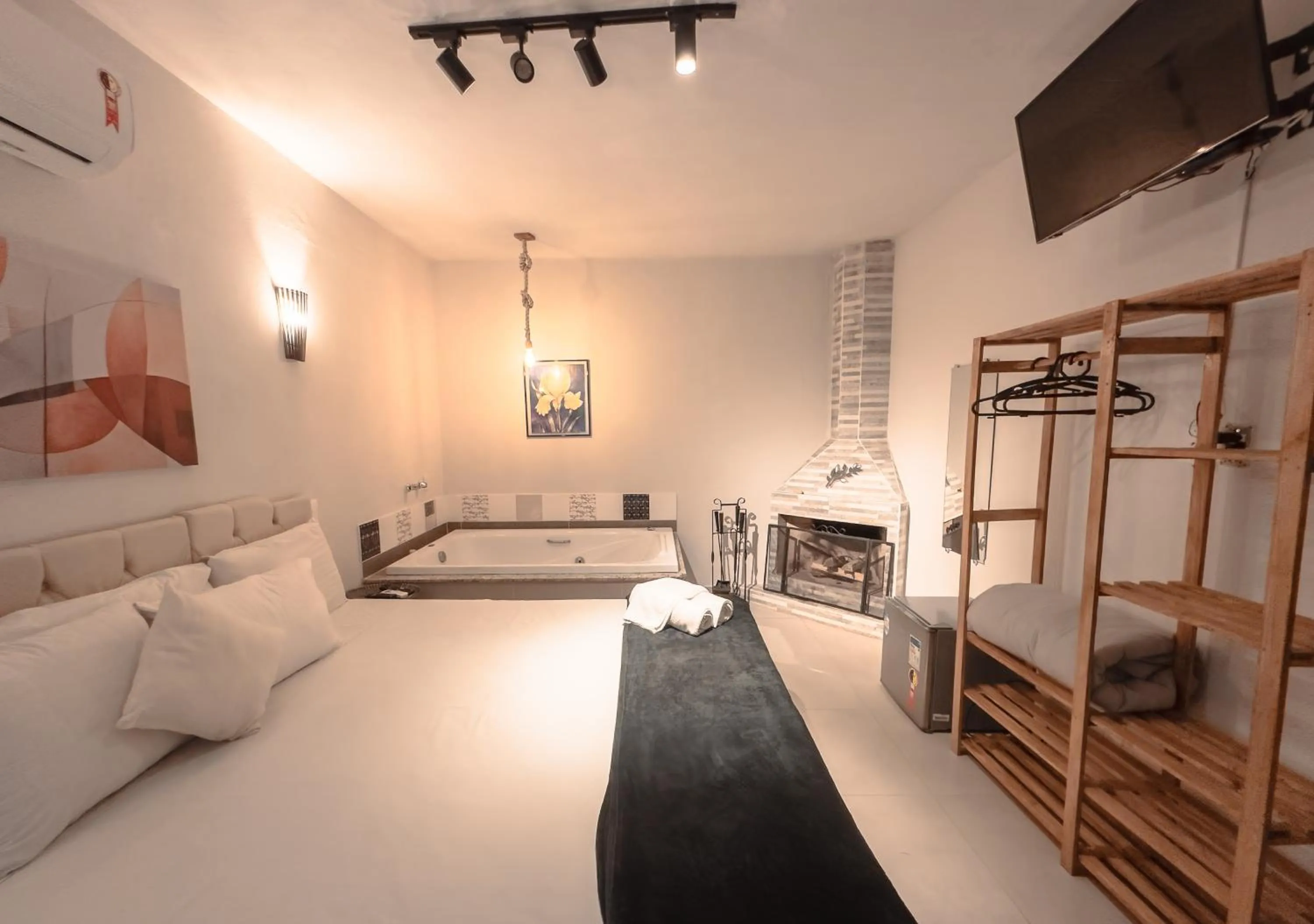 Bed in Pousada Flor de Penedo