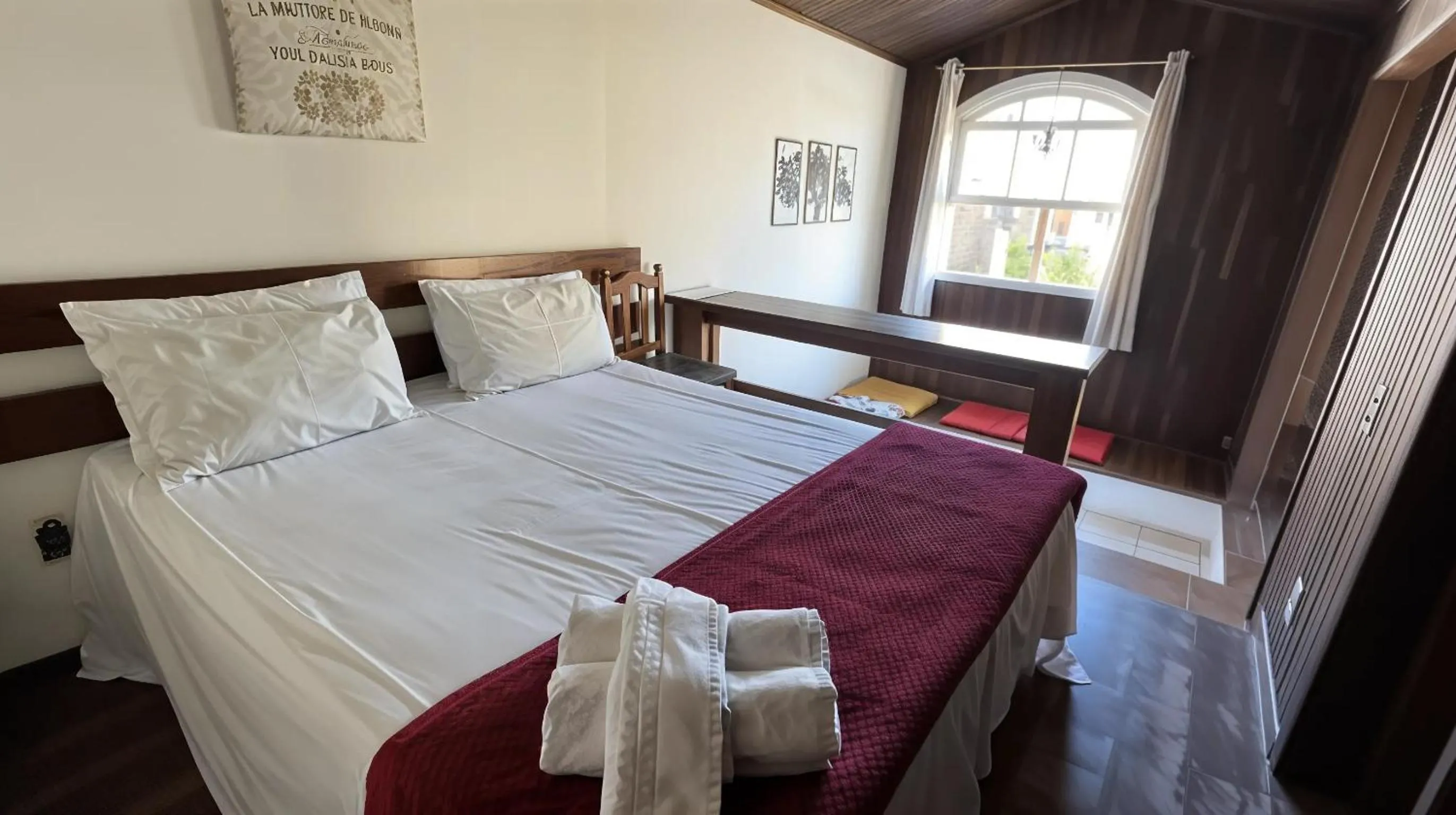 Bed in Pousada Flor de Penedo