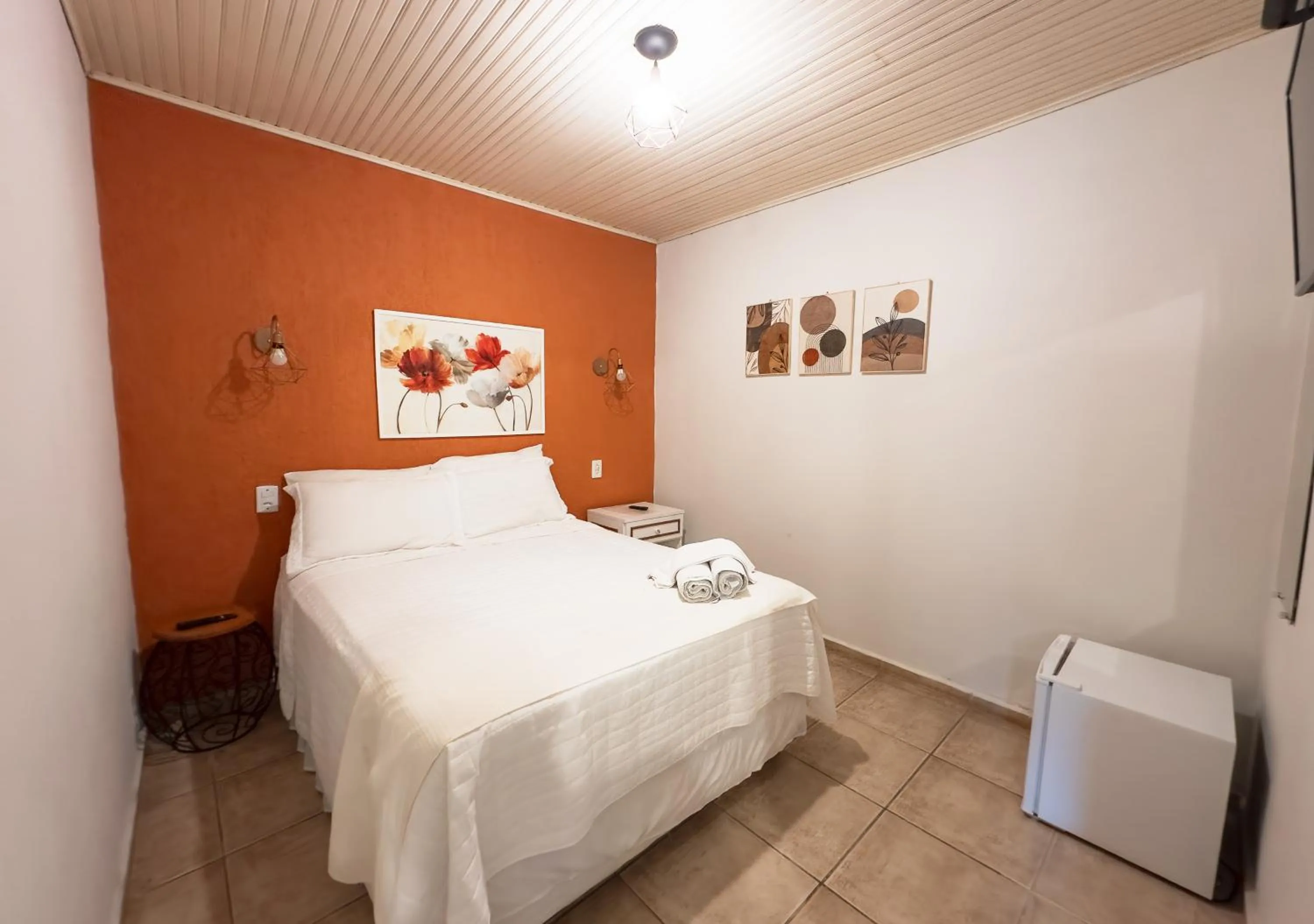 Bed in Pousada Flor de Penedo