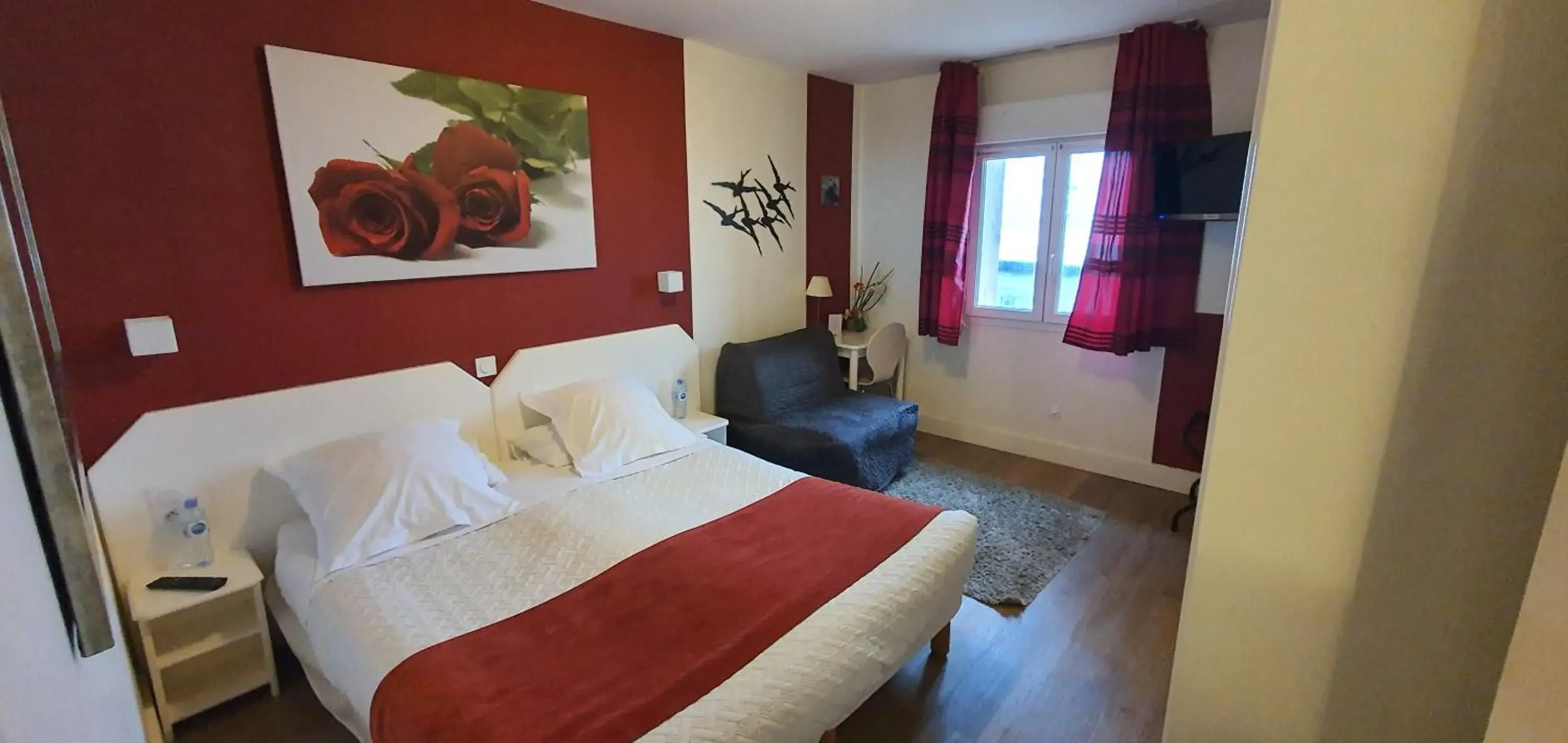 Triple Room in Hotel Cote d'Argent Triple Room in Hotel Cote d'Argent