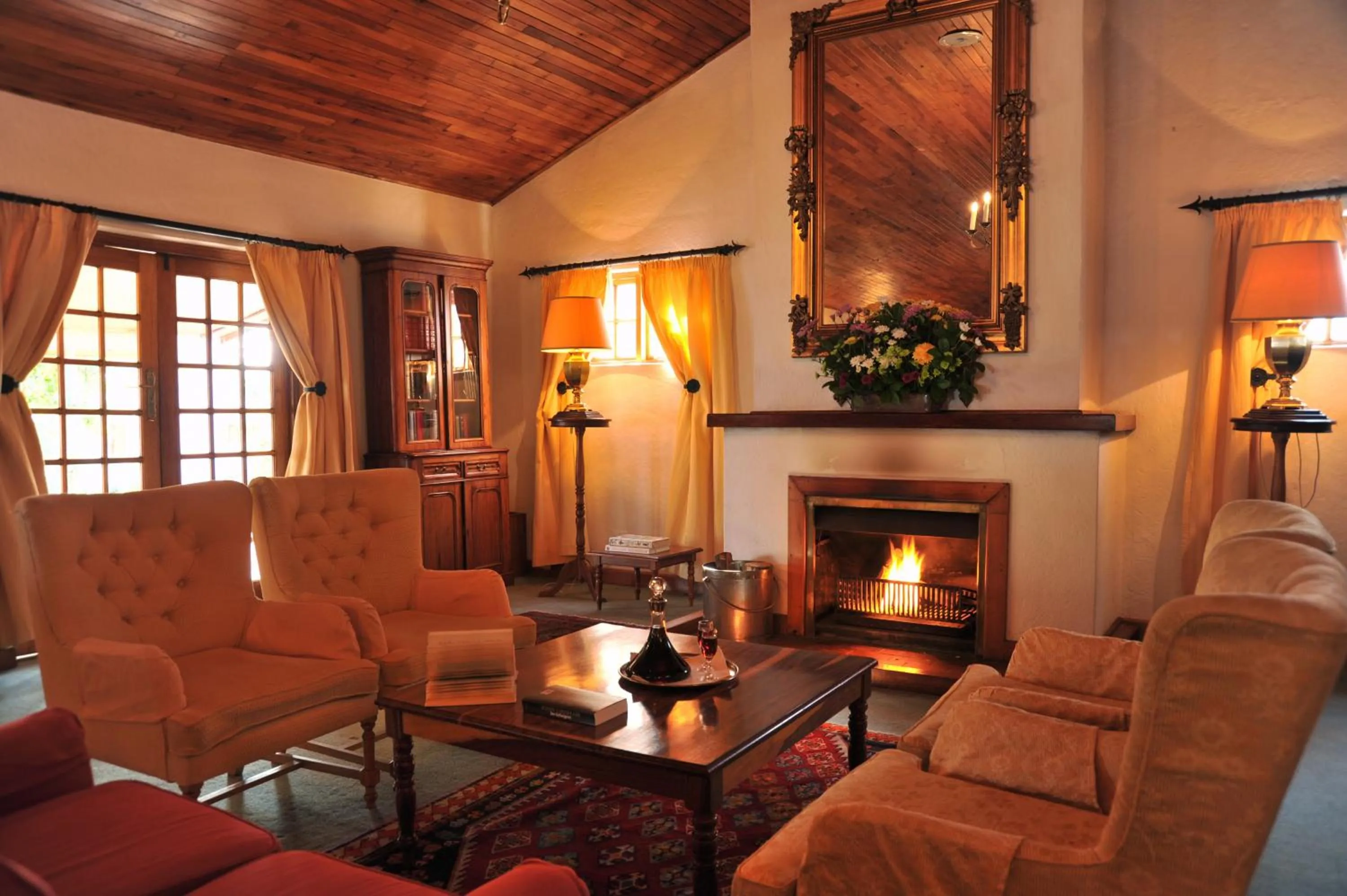 Communal lounge/ TV room in Coach House Hotel & Spa Tzaneen