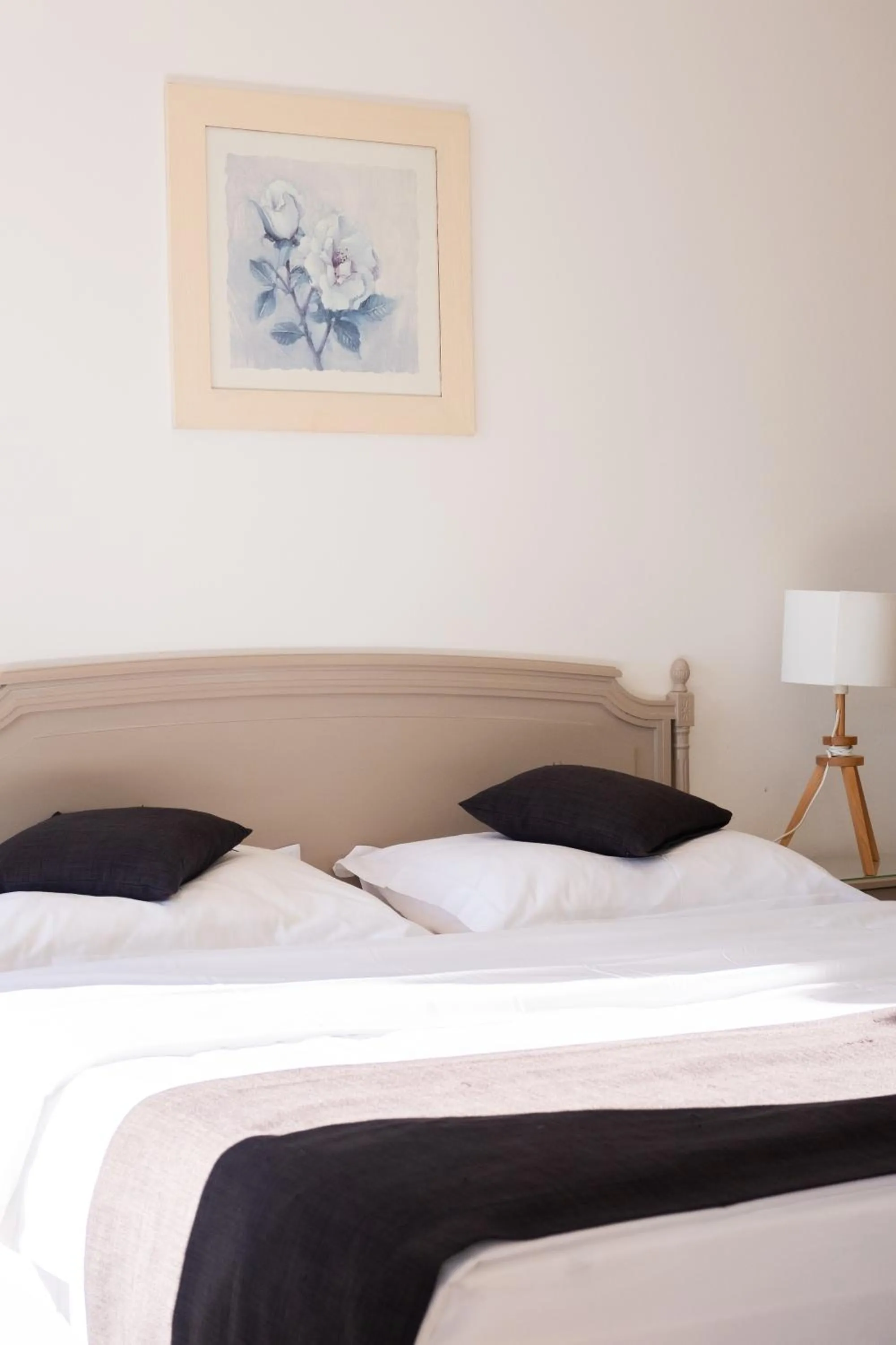 Bed in Baron Tavernier Hotel Restaurant & SPA