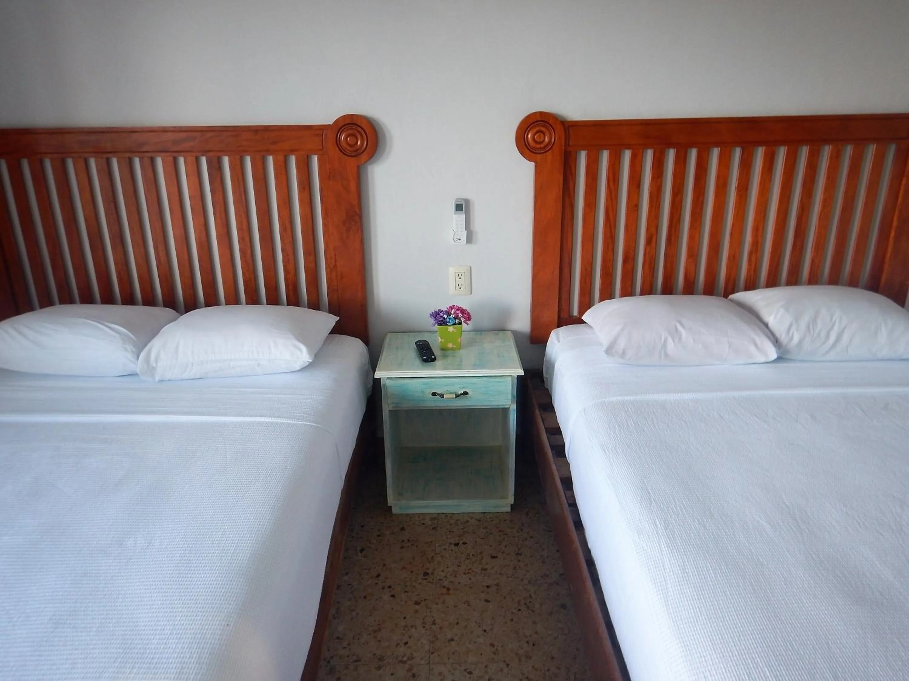 Bed in Blue Coconut Cancun Hotel