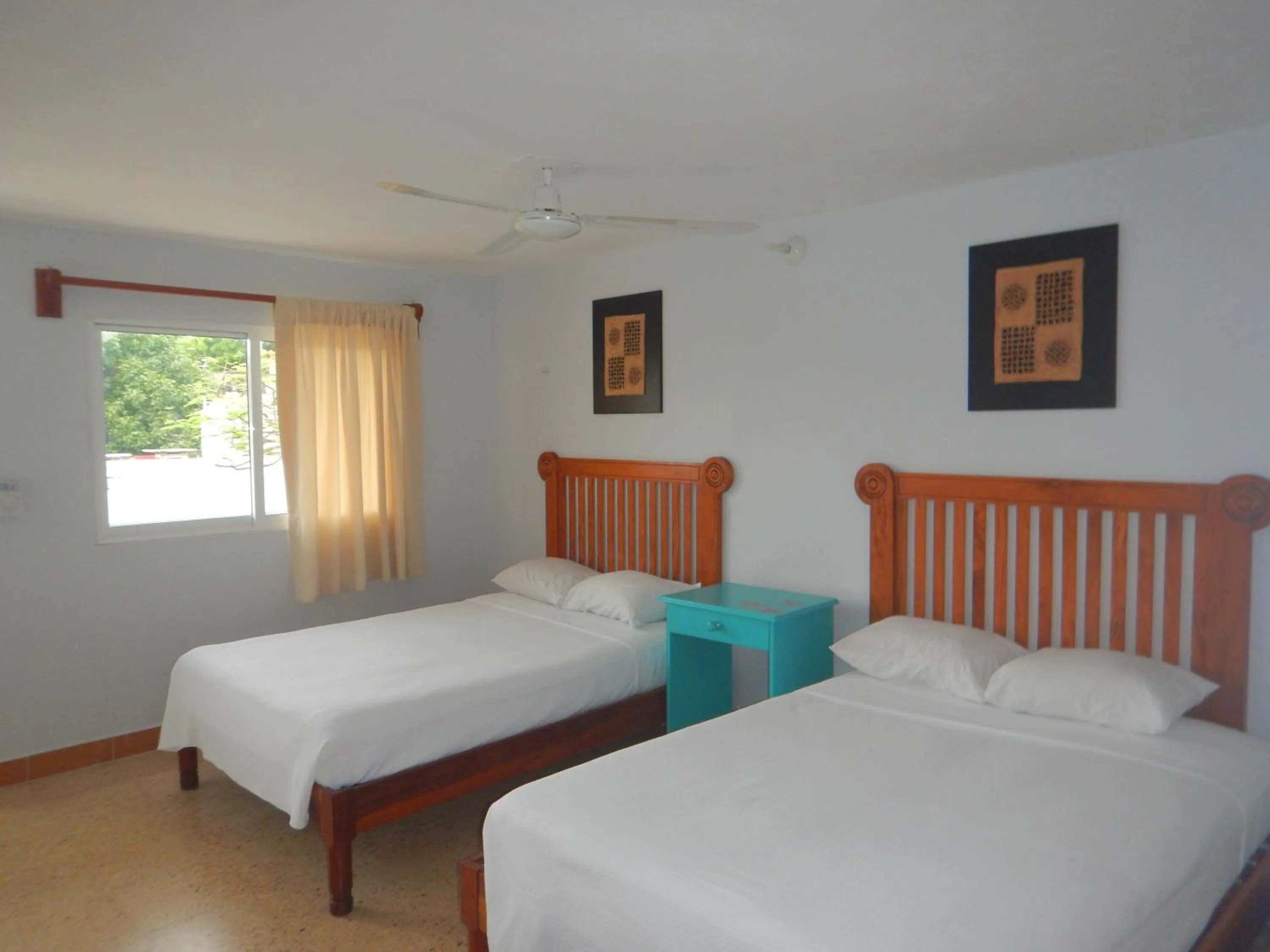 Bed in Blue Coconut Cancun Hotel