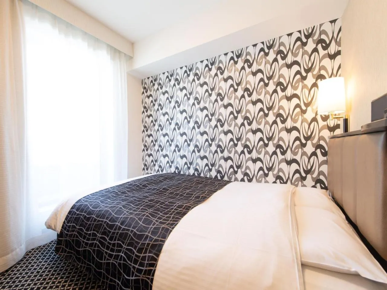 Bed in APA Hotel TKP Tokyo Nishi-Kasai