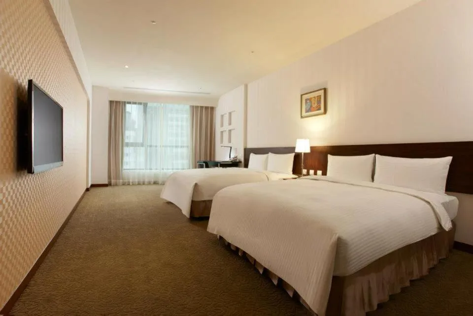 Bed in Taisugar Hotel Taipei