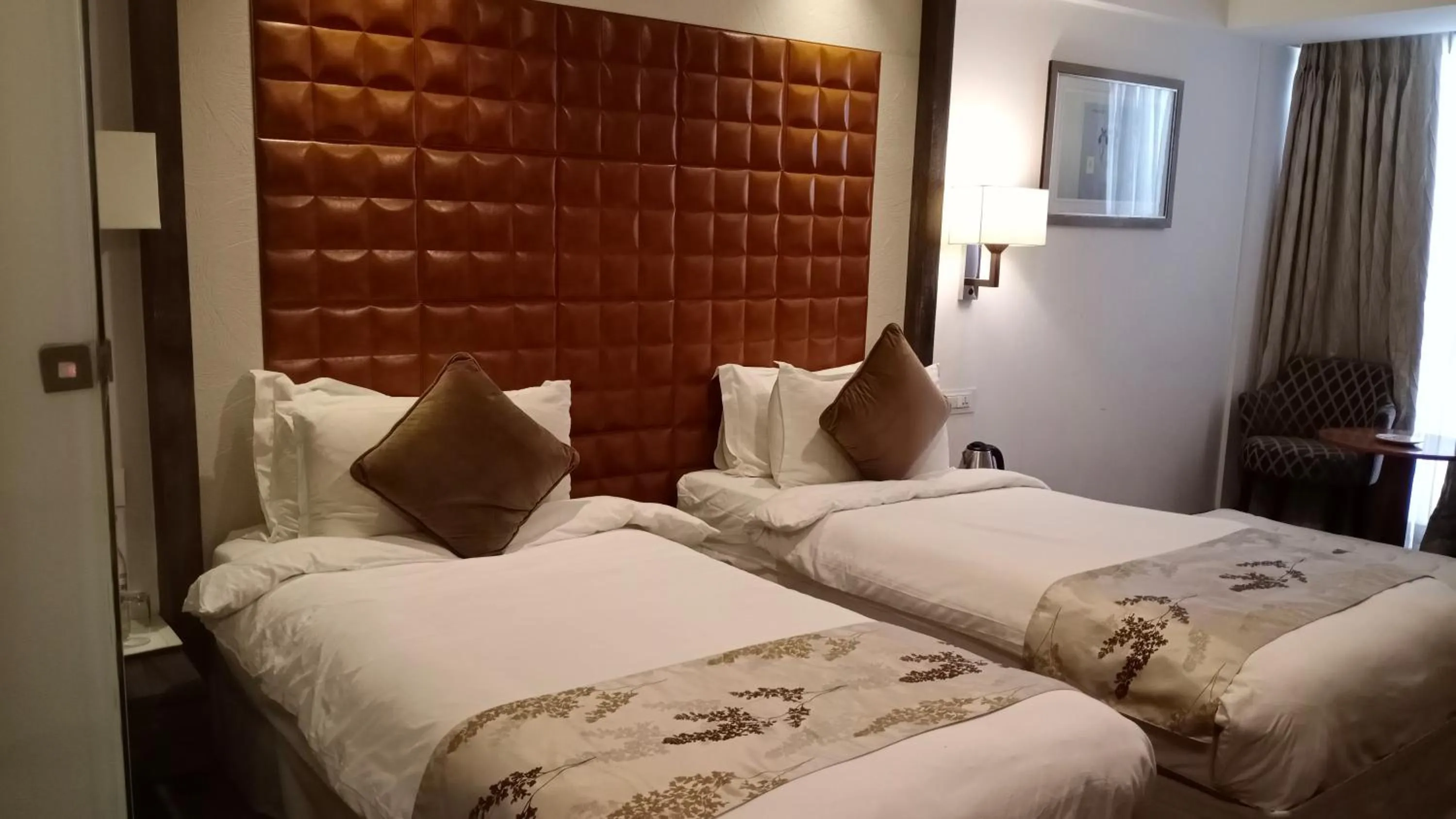 Bedroom, Bed in Regenta Central Hotel & Convention Centre Nagpur