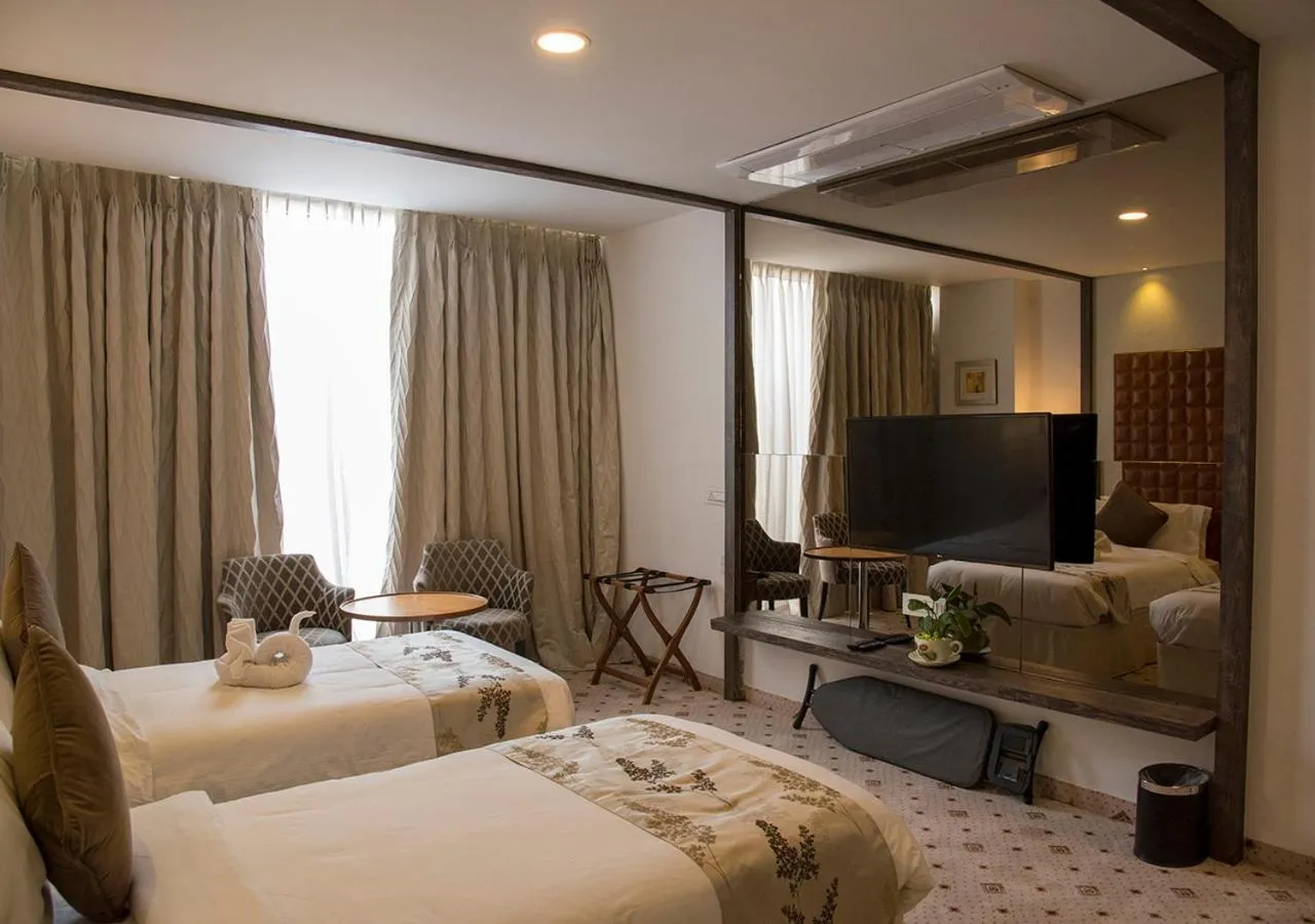 Bedroom, Bed in Regenta Central Hotel & Convention Centre Nagpur