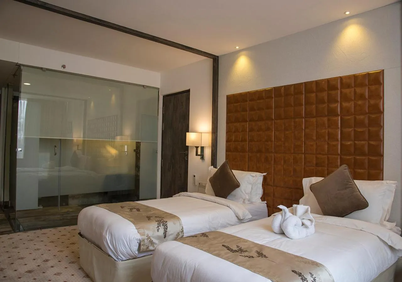 Bedroom, Bed in Regenta Central Hotel & Convention Centre Nagpur