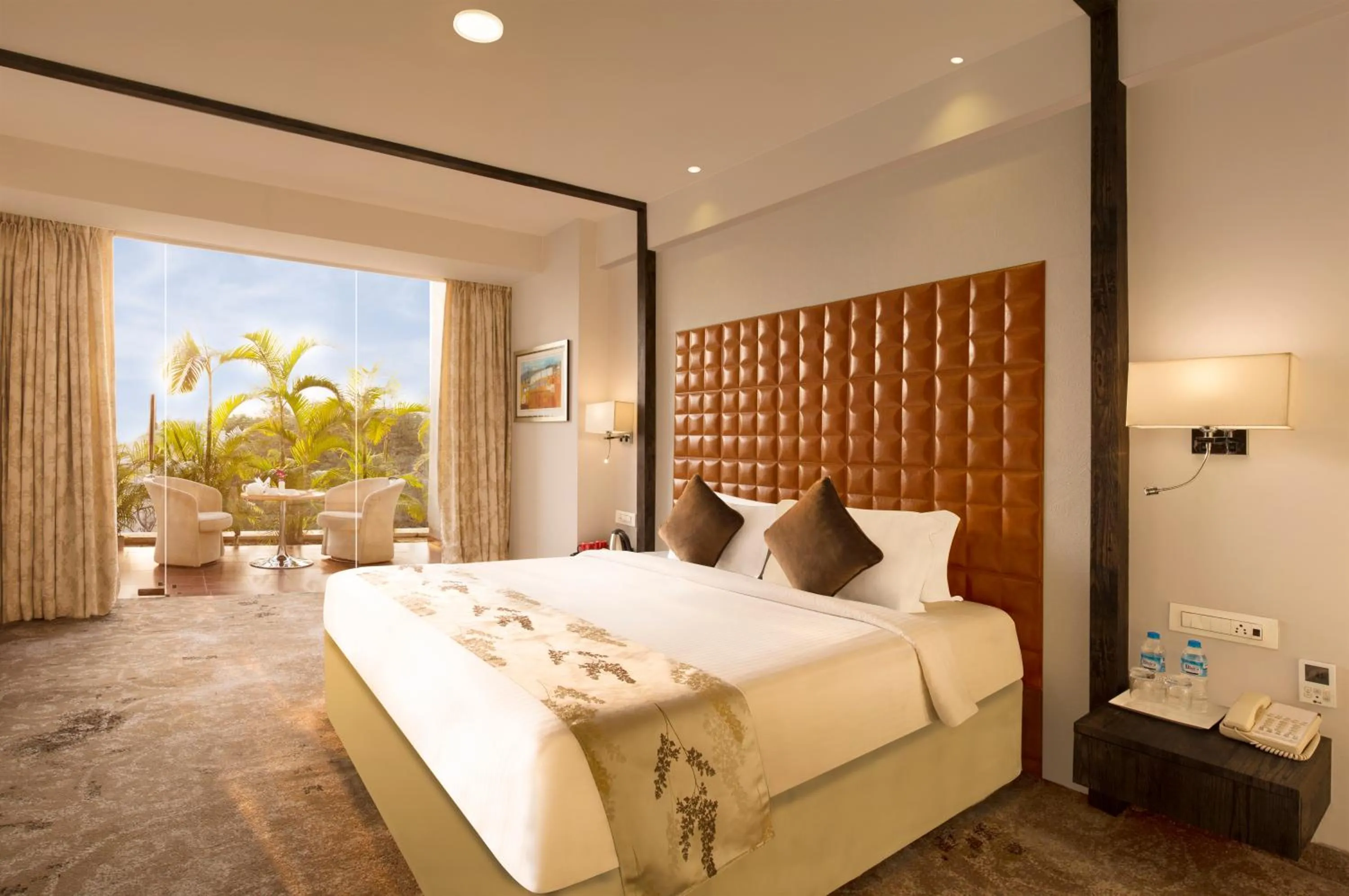 Bed in Regenta Central Hotel & Convention Centre Nagpur