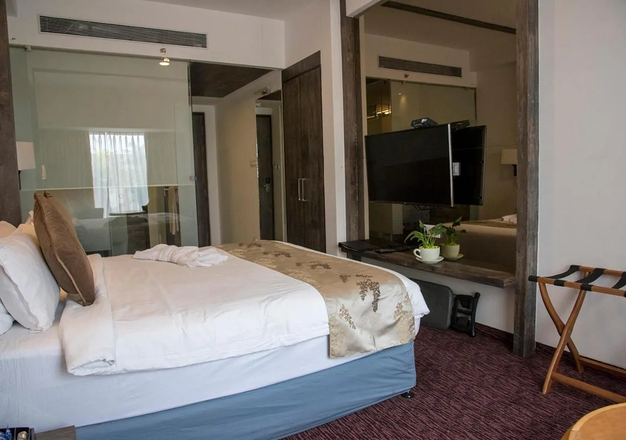 Bedroom, Bed in Regenta Central Hotel & Convention Centre Nagpur