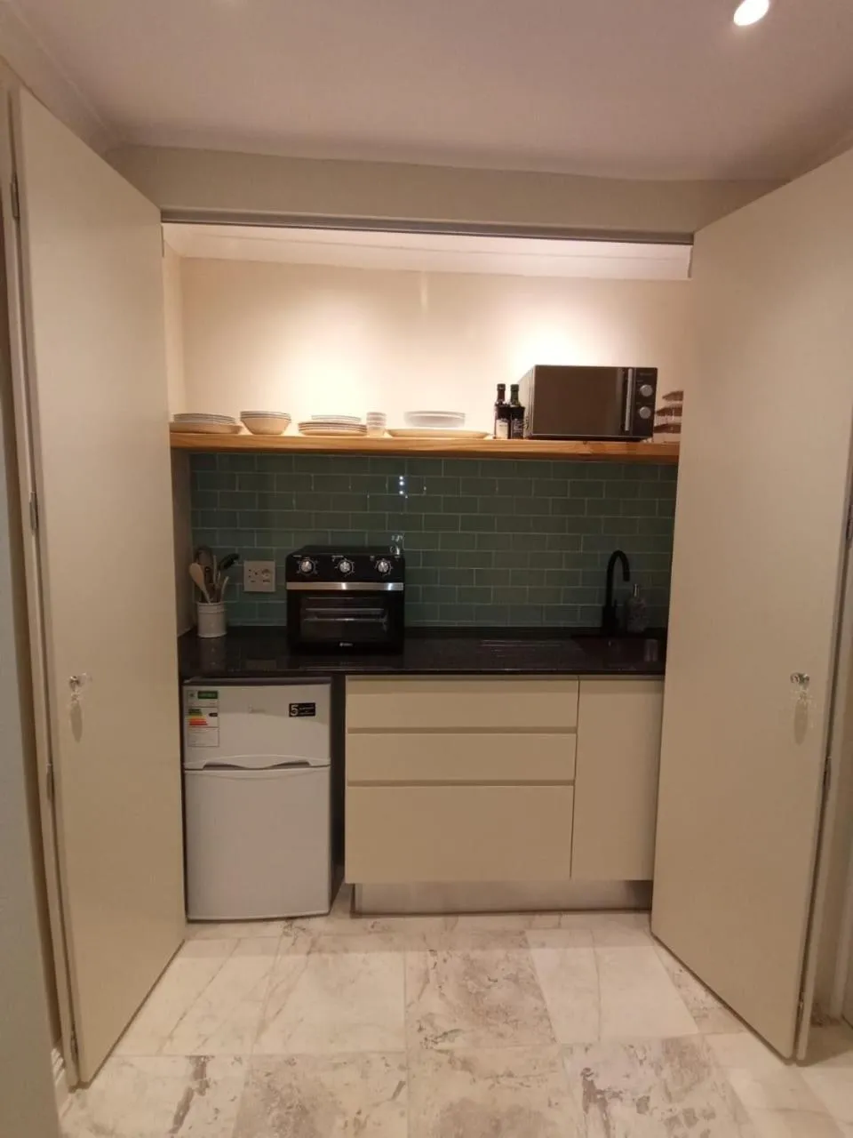 Kitchen or kitchenette in The Andros Boutique Hotel