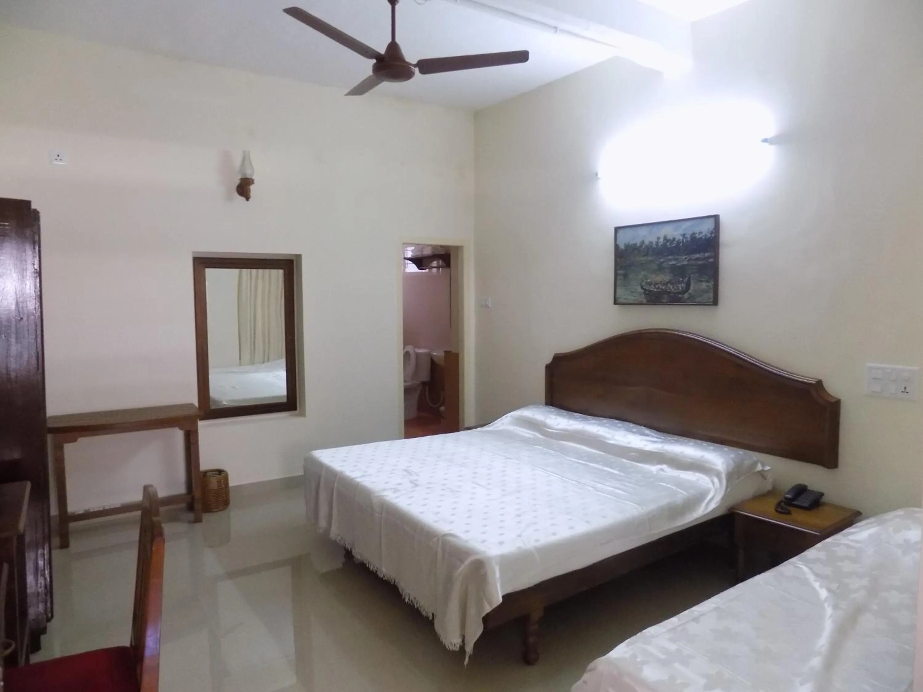 Photo of the whole room, Bed in Safire Residency