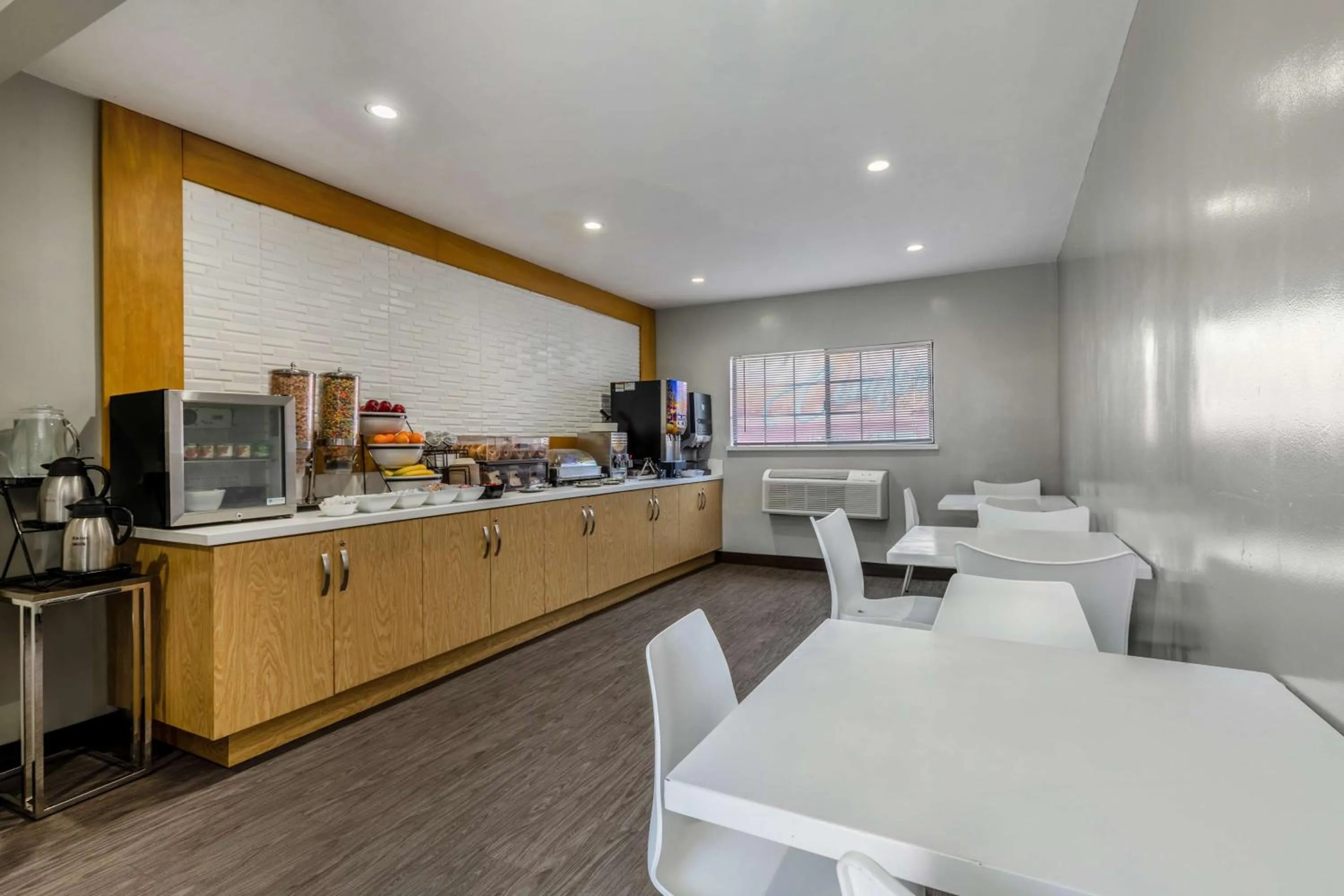 Breakfast in Sunset West Hotel, SureStay Collection By Best Western