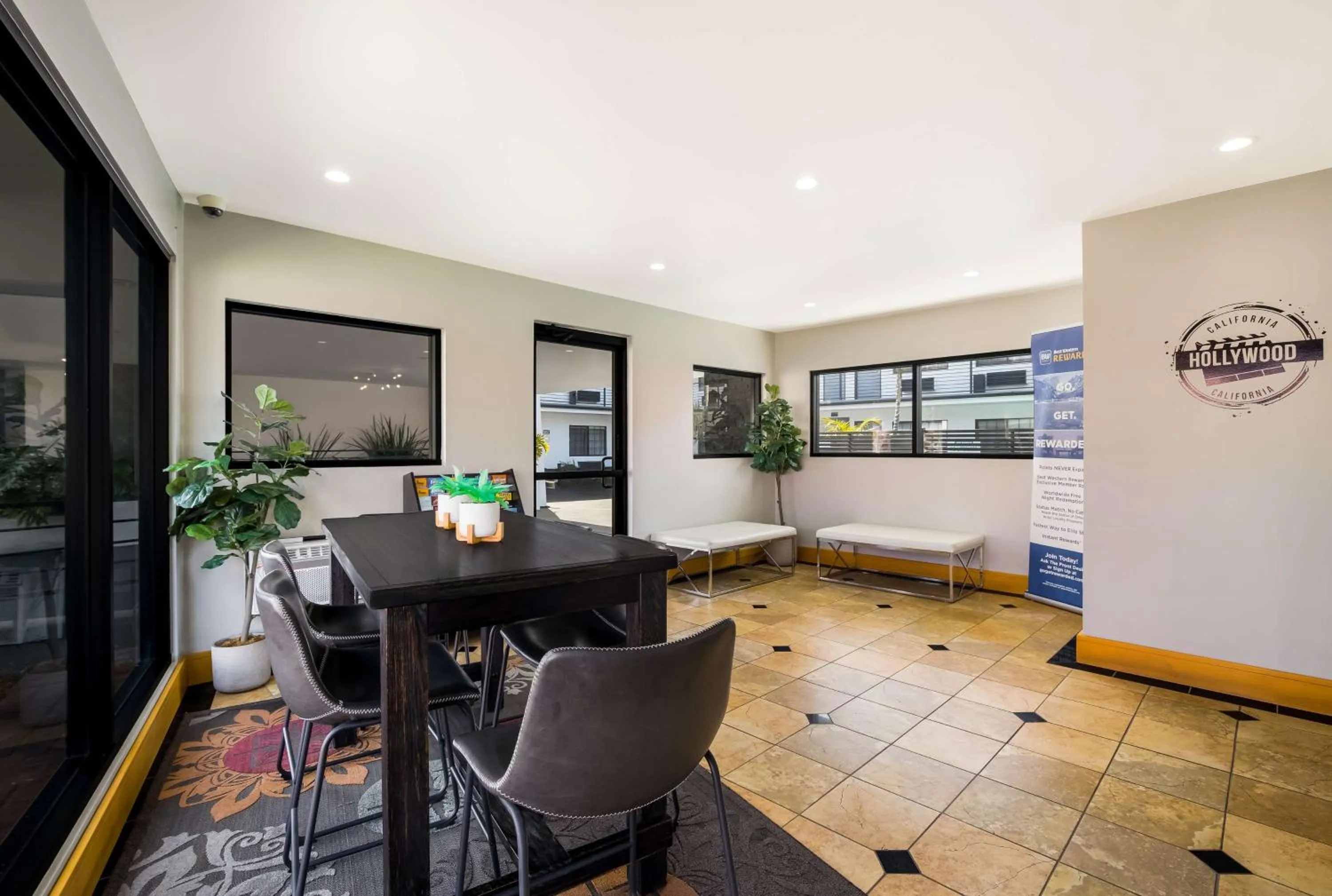 Lobby or reception in Sunset West Hotel, SureStay Collection By Best Western