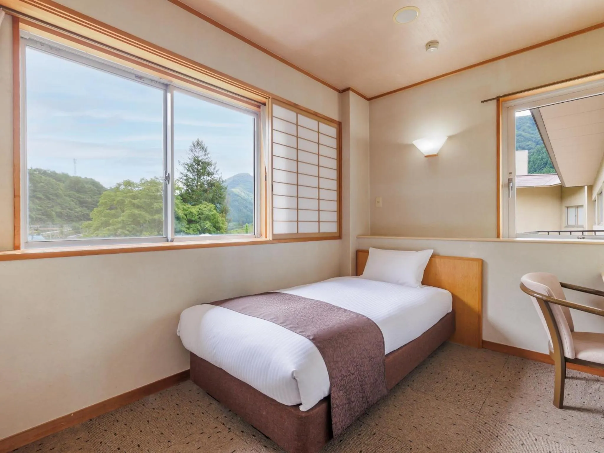 Photo of the whole room, Bed in KAMENOI HOTEL Akita Yuze
