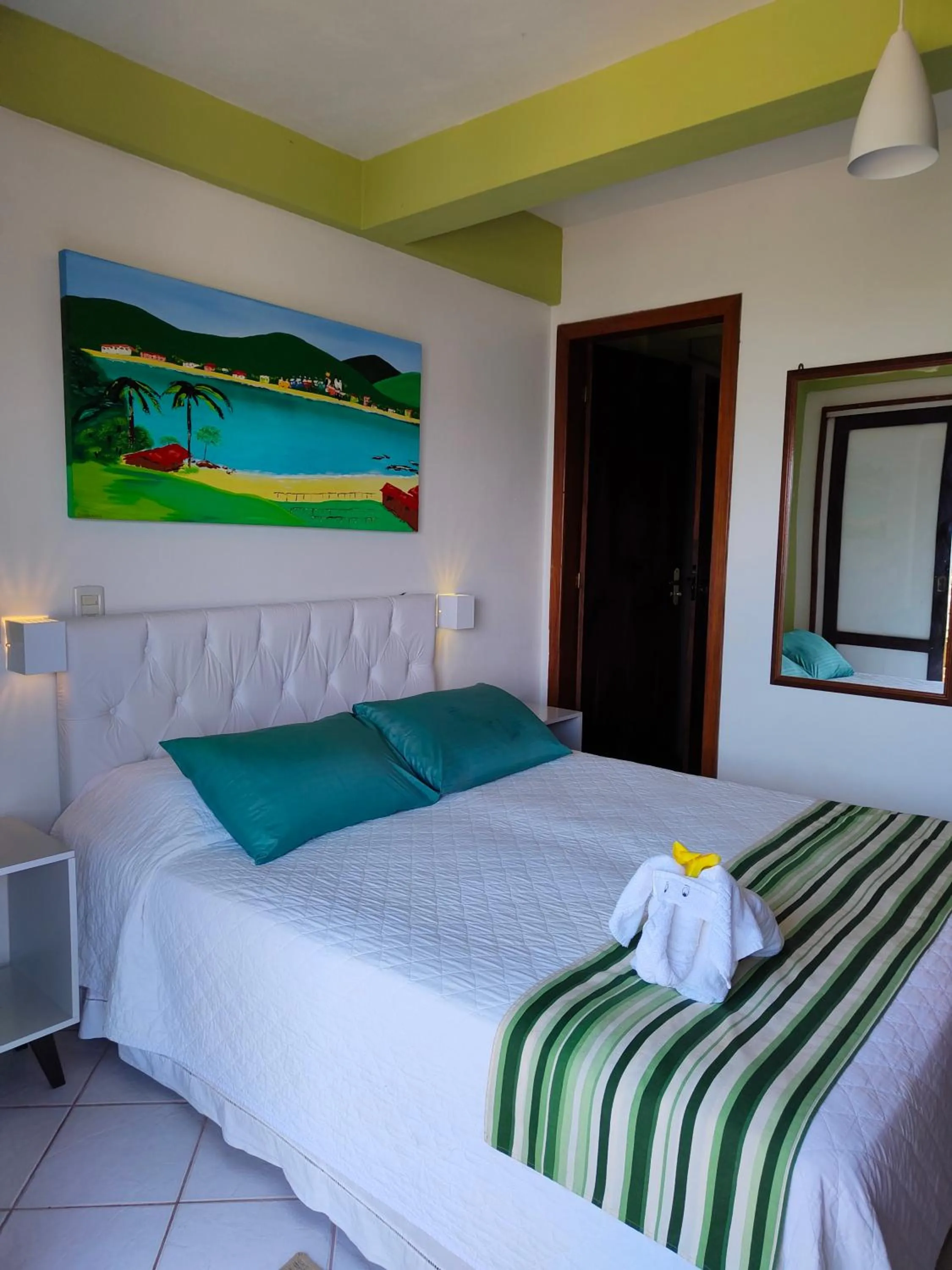 Bed in Pousada Palmeiras