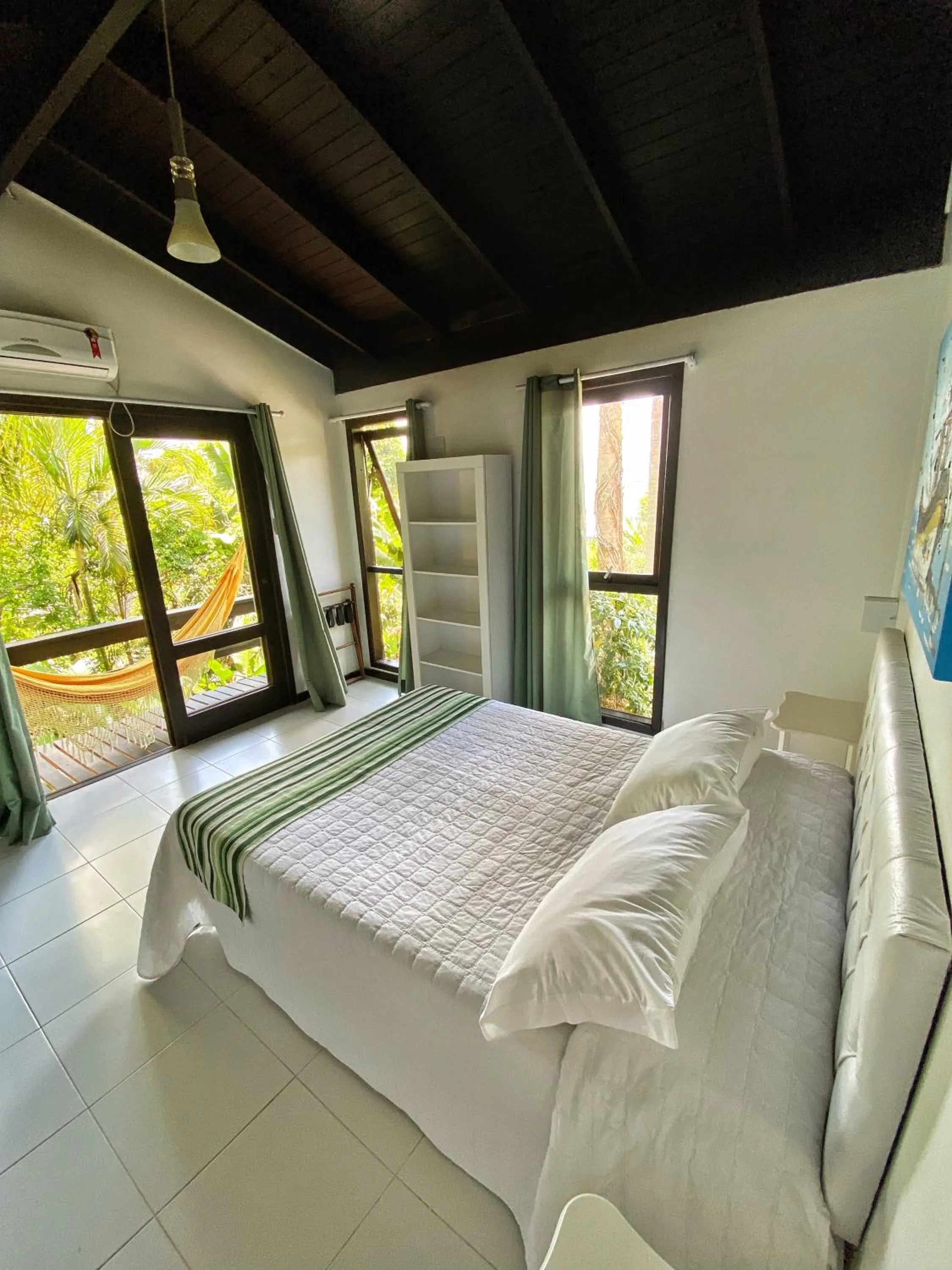 Bed in Pousada Palmeiras