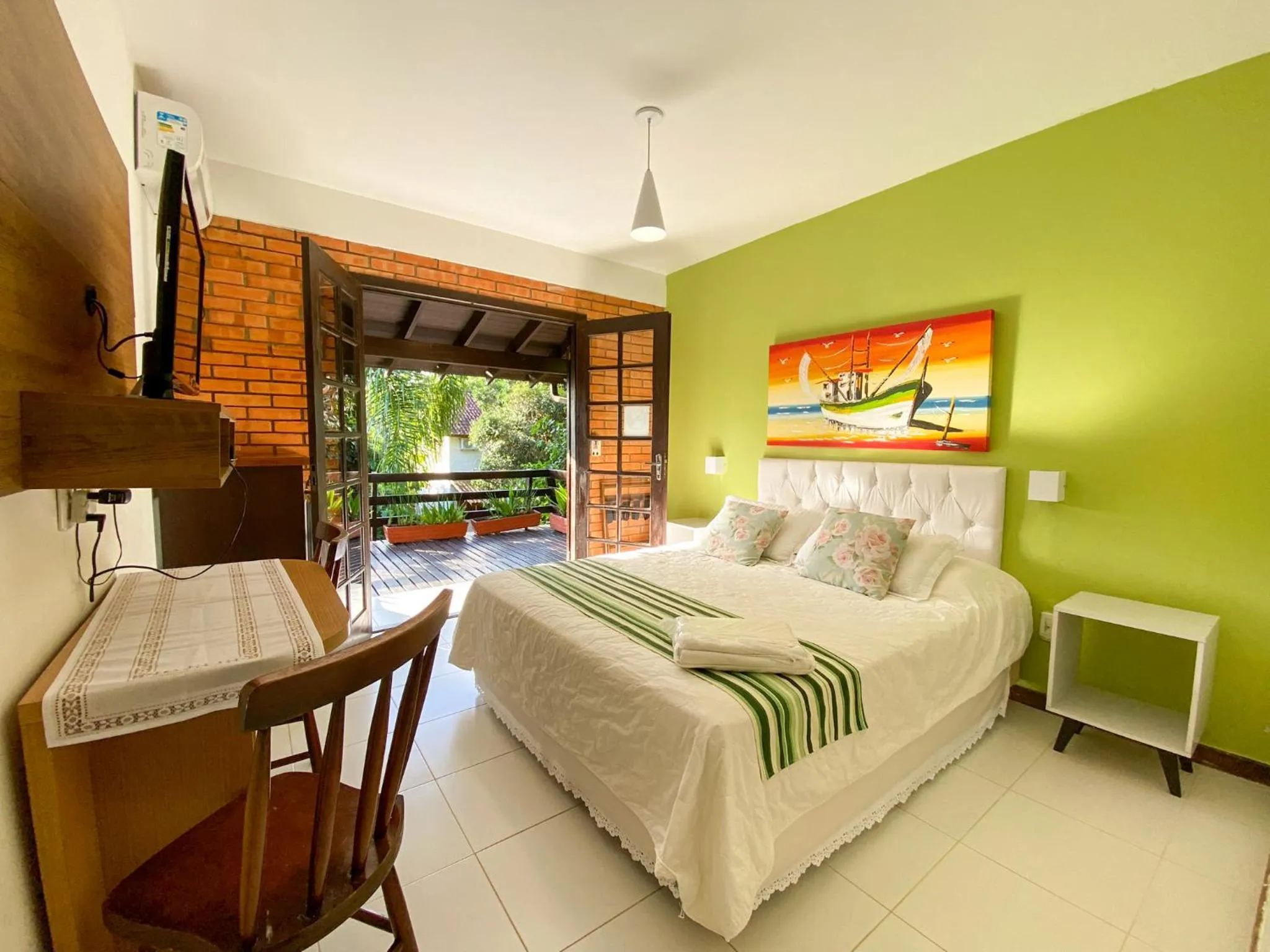 Bed in Pousada Palmeiras