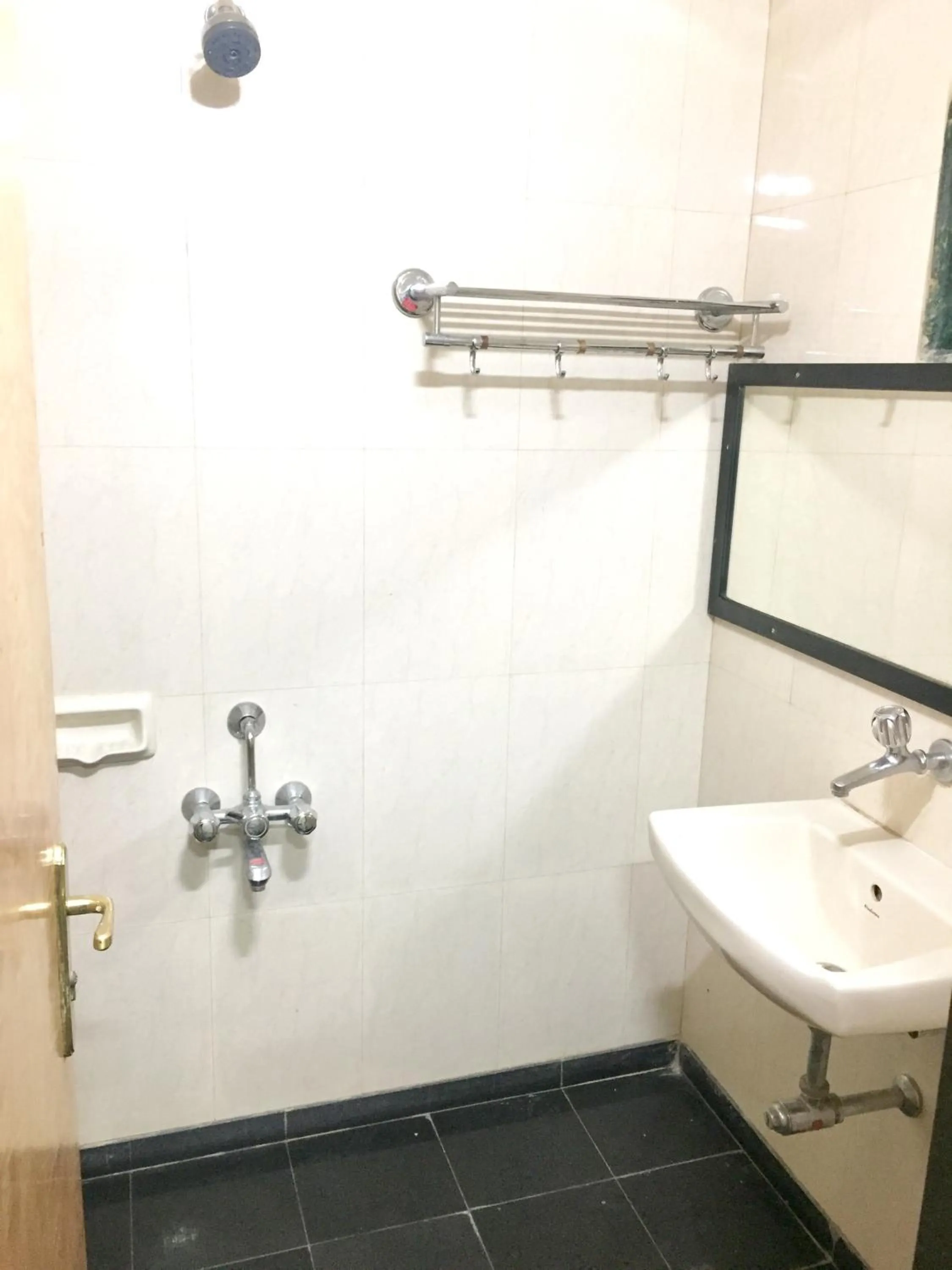 Bathroom in Hotel New Uttam Hira Palace