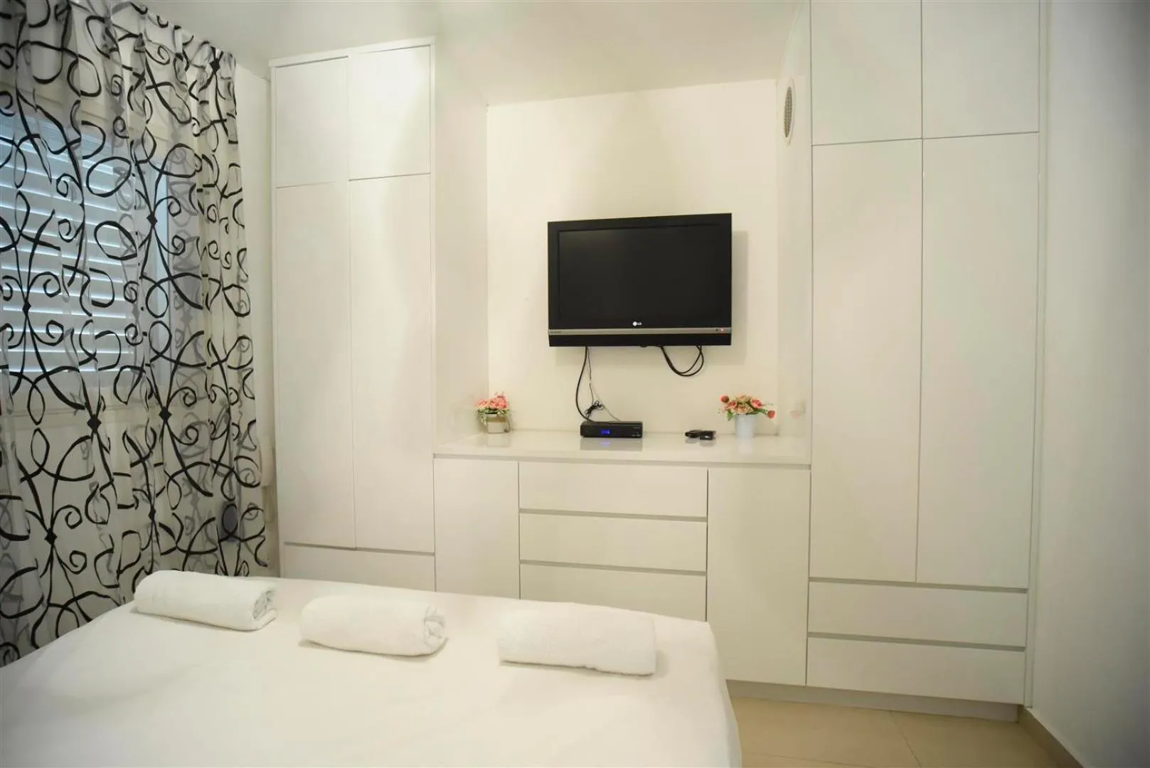 Bed in City Resort Palmore