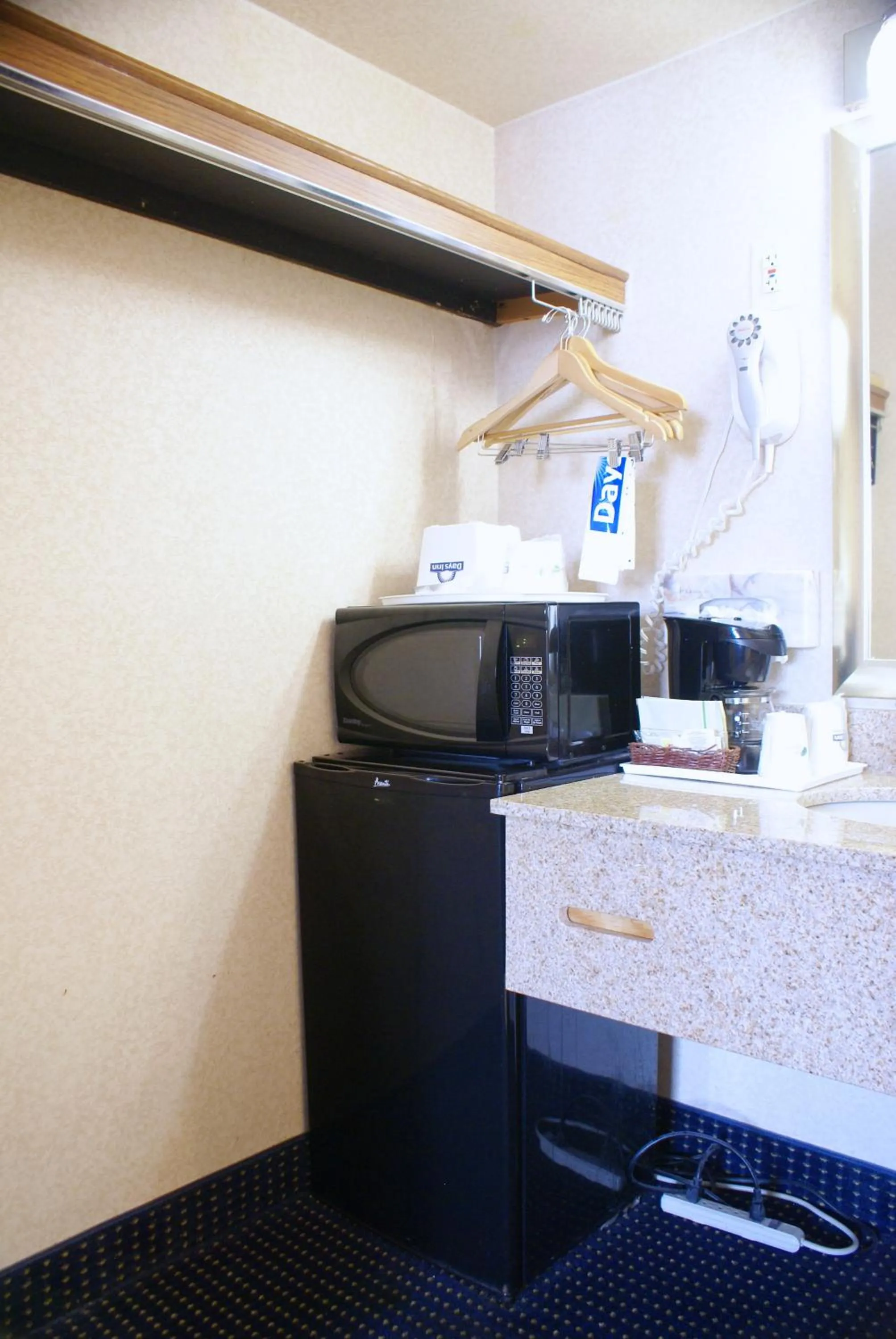 Kitchen or kitchenette in Days Inn by Wyndham Arlington Pentagon